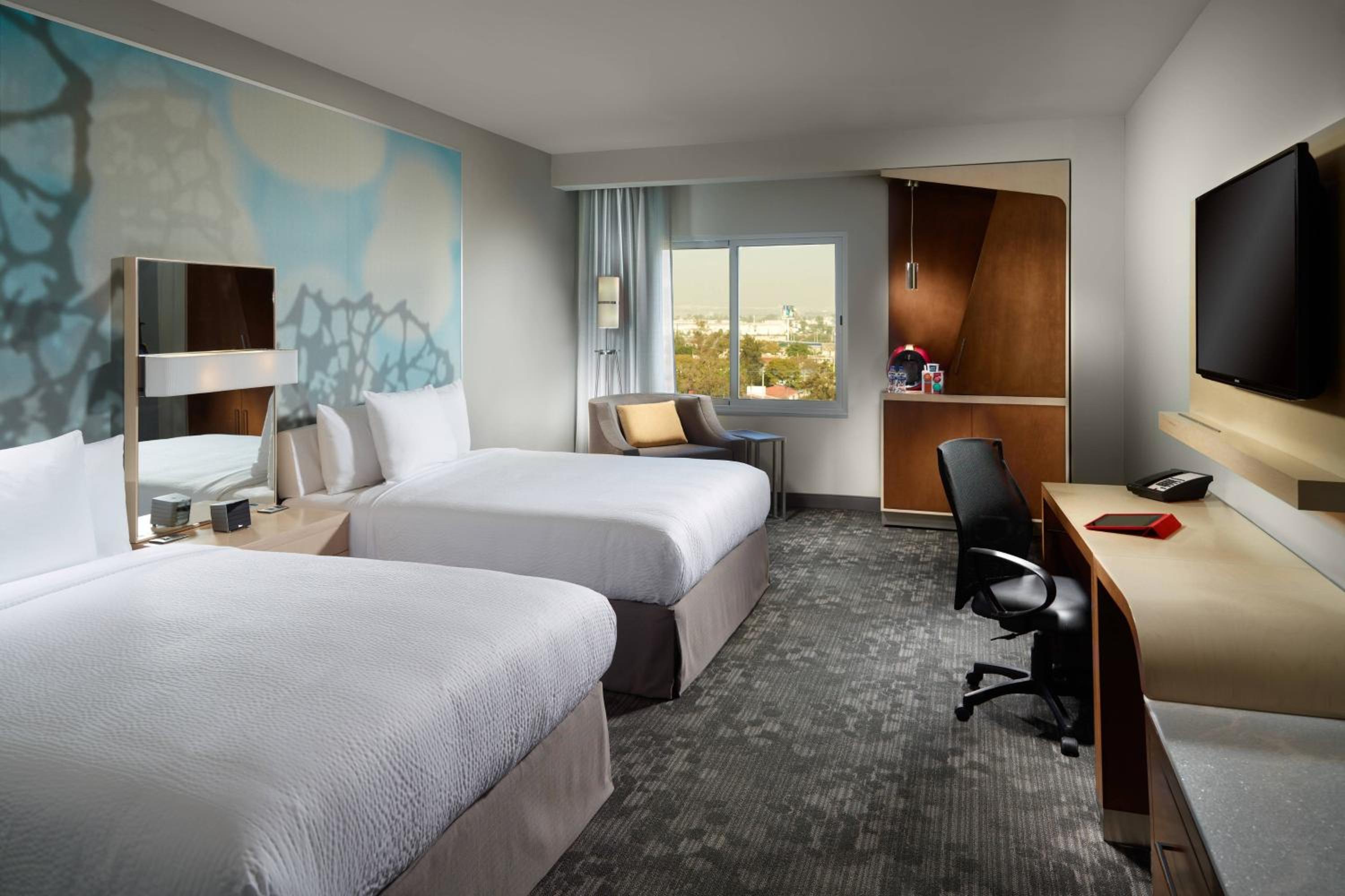 Double Room with Two Double Beds and City View