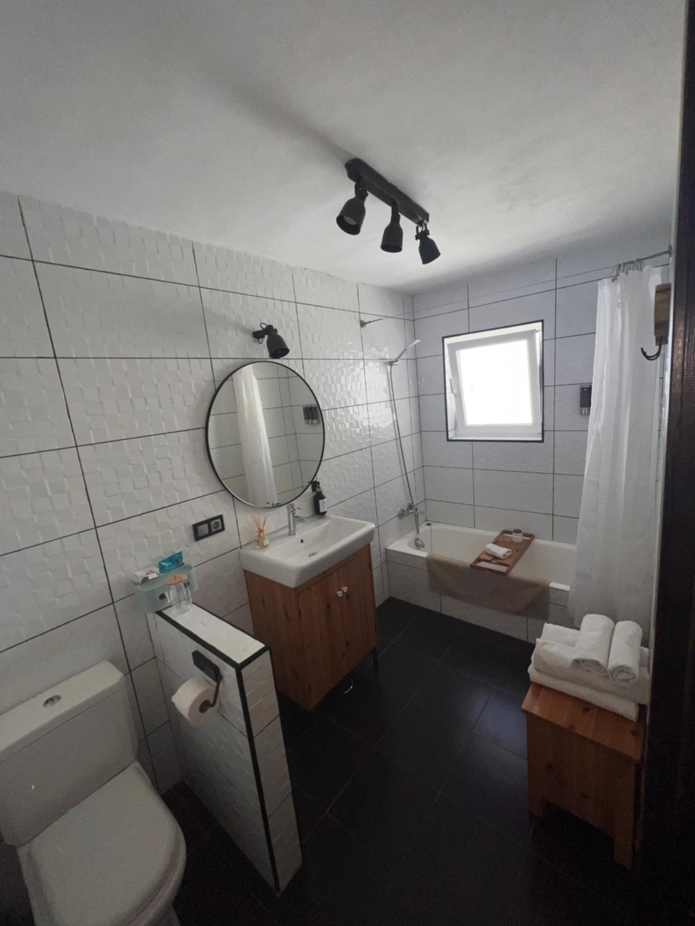 Three-Bedroom House - Photo 17