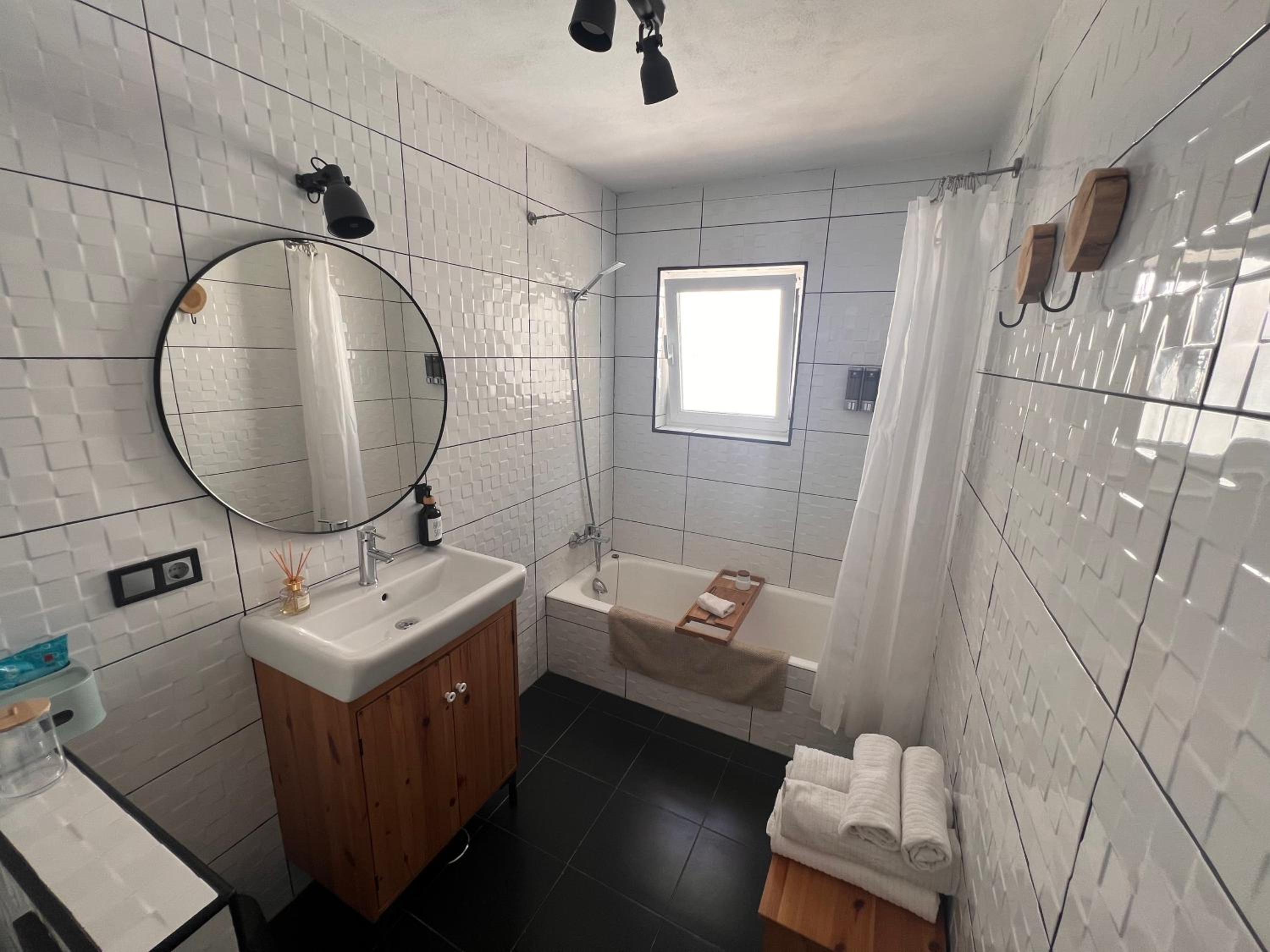 Three-Bedroom House - Photo 16