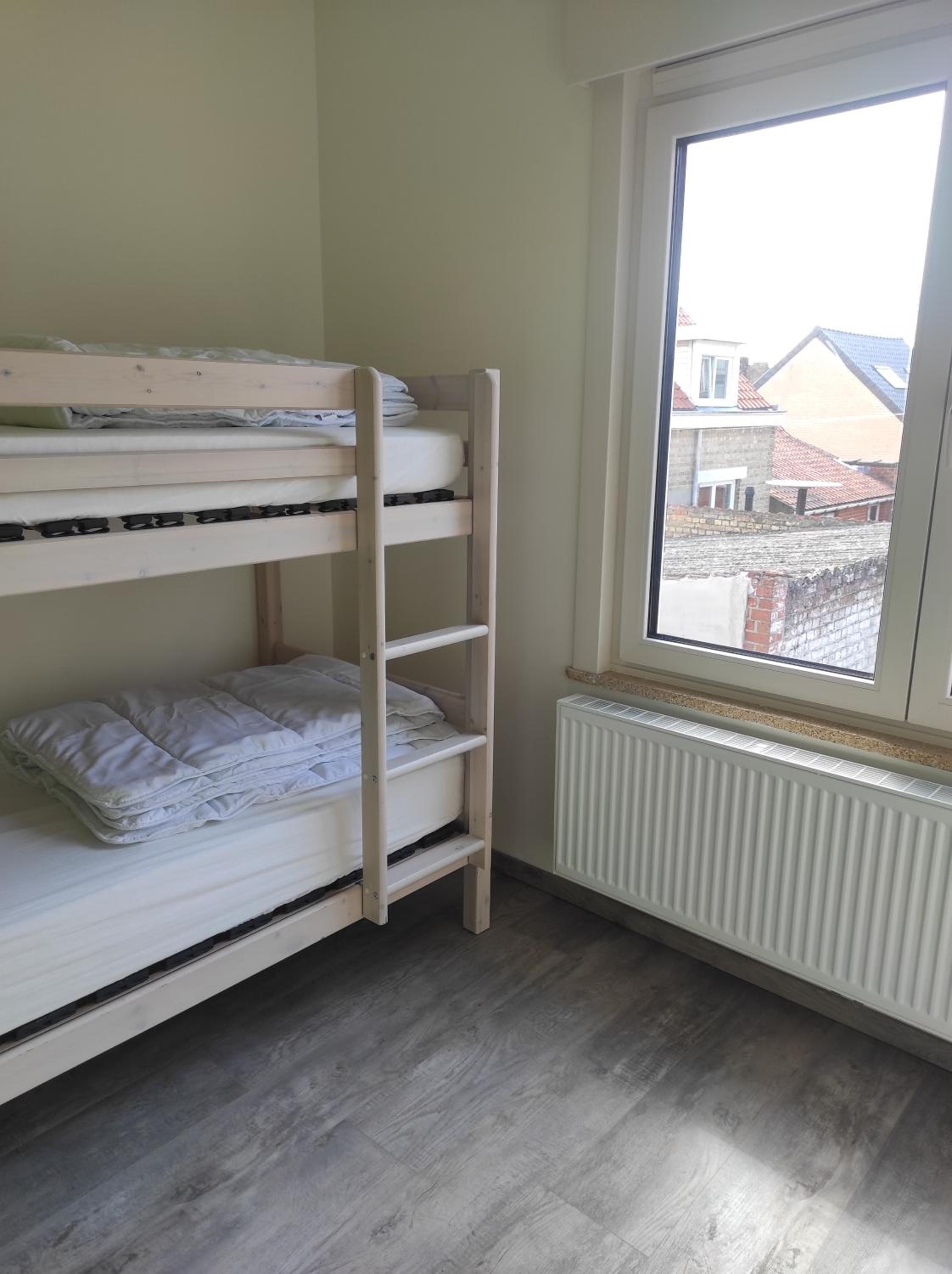 Three-Bedroom Apartment - Photo 14