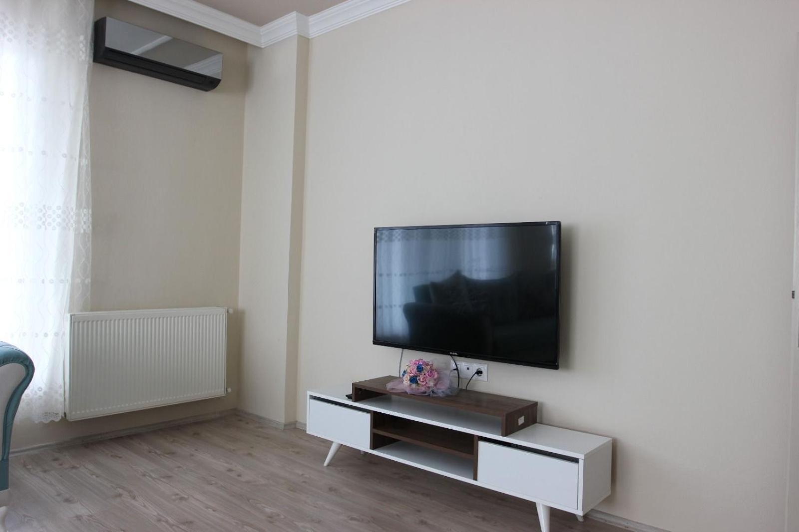 Three-Bedroom Apartment photo 1
