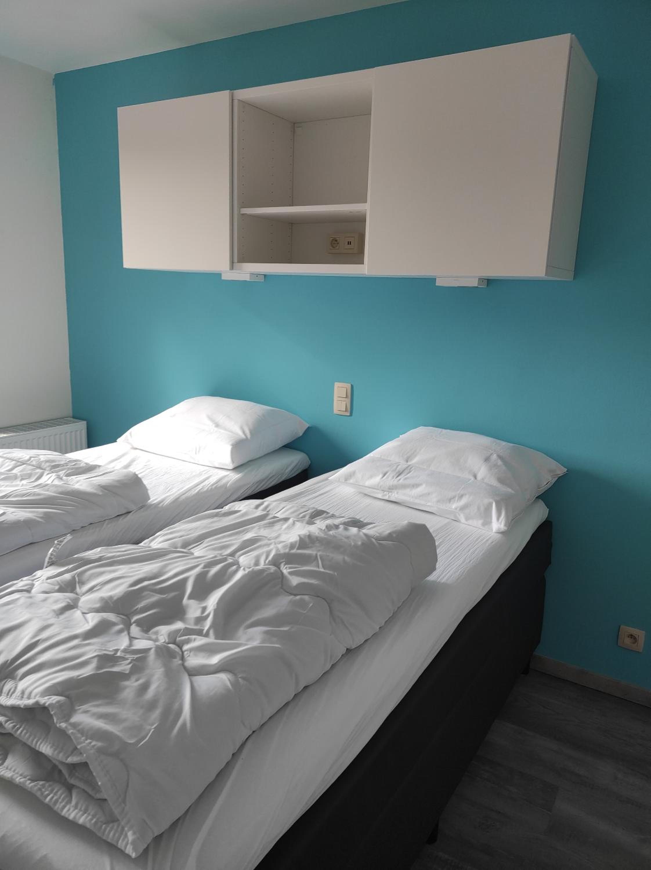 Three-Bedroom Apartment - Photo 7