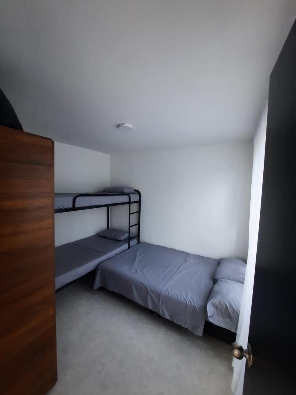 Three-Bedroom Apartment photo 1
