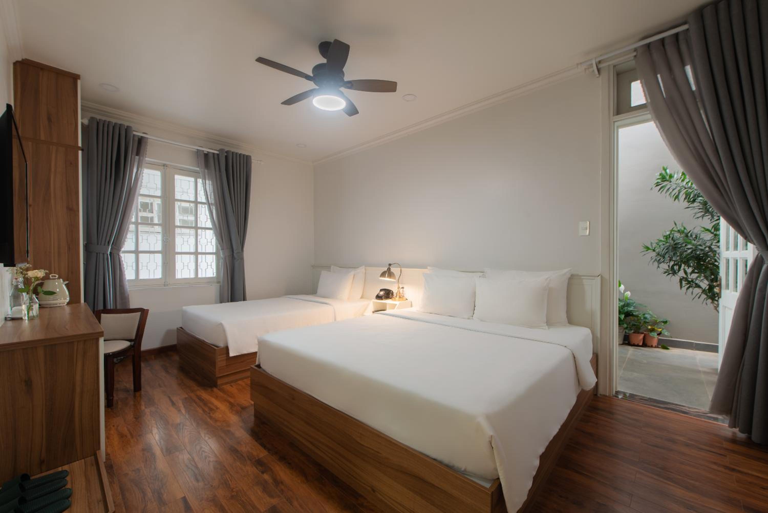 Deluxe Triple Room - Photo 13