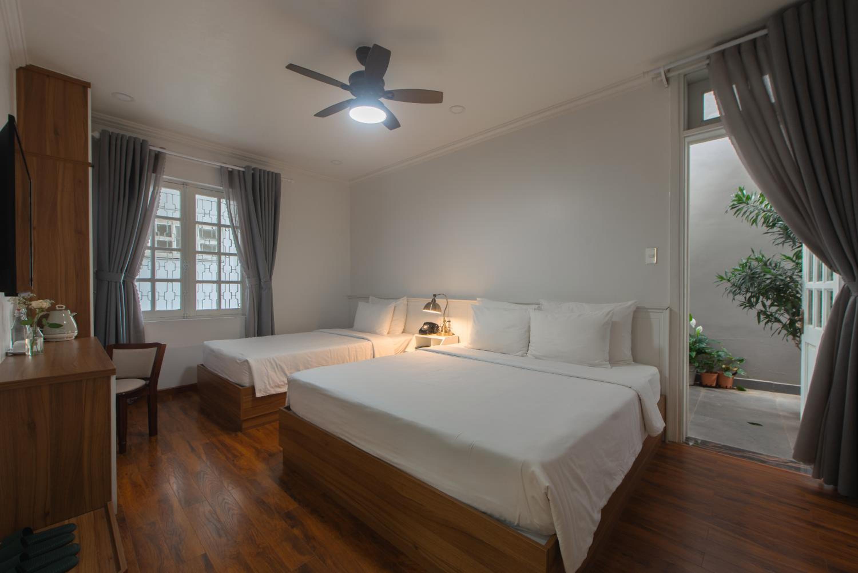 Deluxe Triple Room - Photo 26