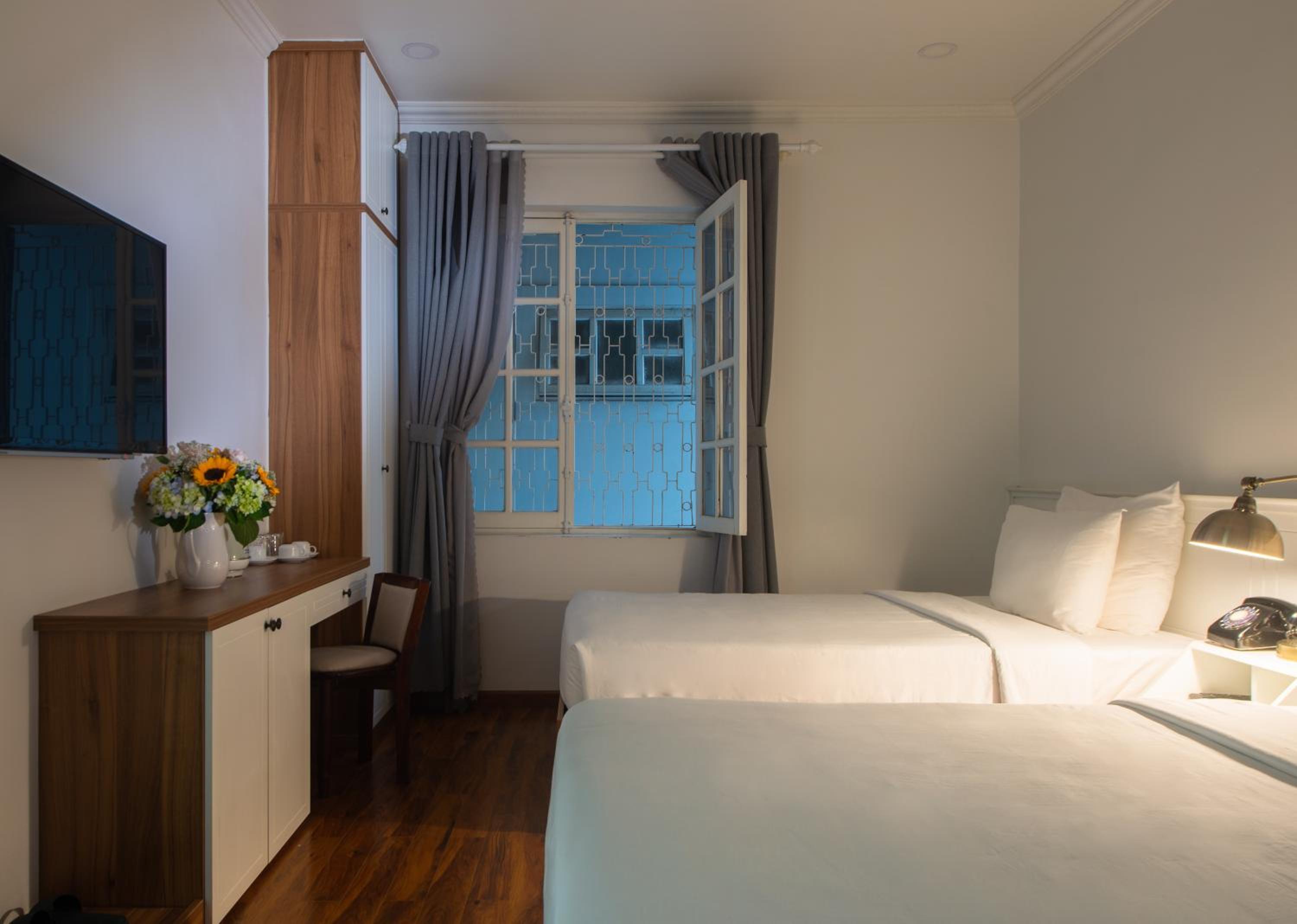 Deluxe Triple Room - Photo 14