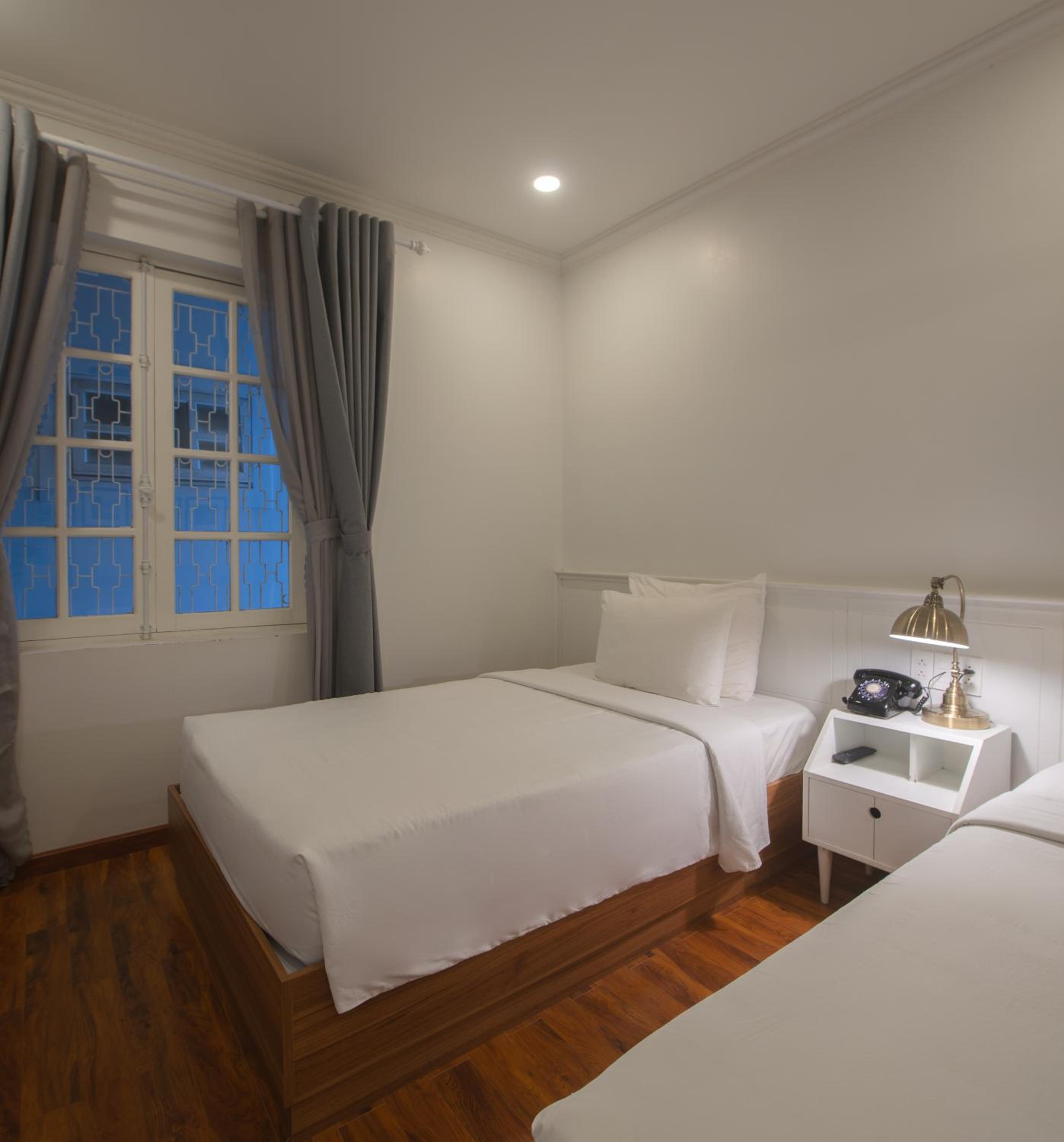Deluxe Triple Room - Photo 18