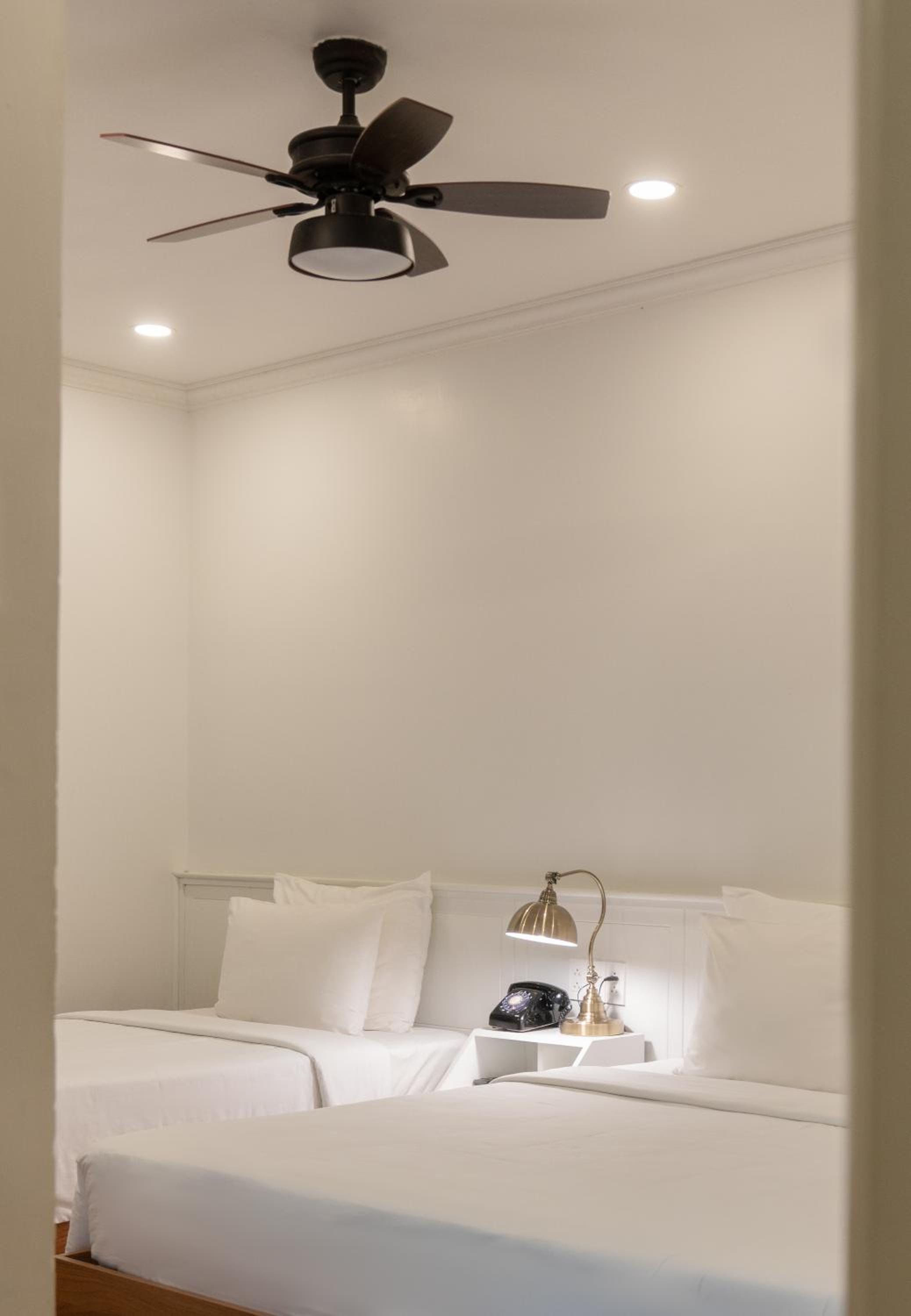 Deluxe Triple Room - Photo 7