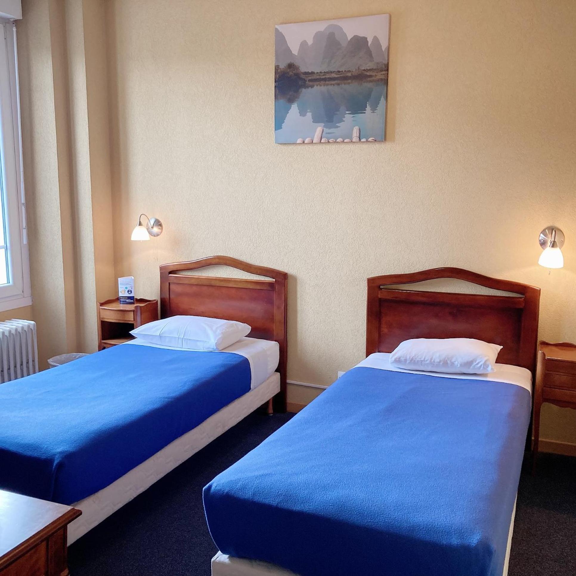 Twin Room - Photo 1