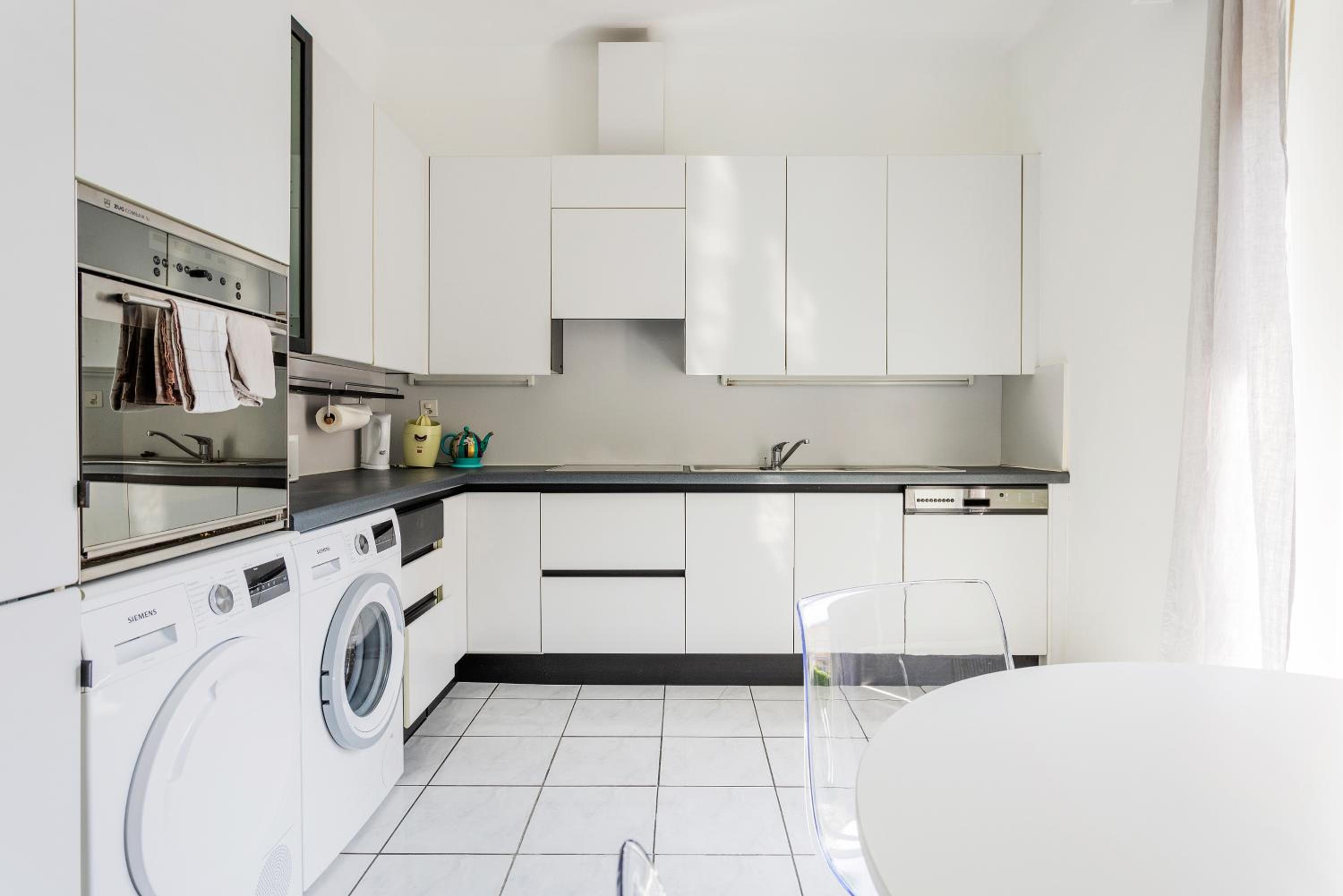 Three-Bedroom Apartment - Photo 16