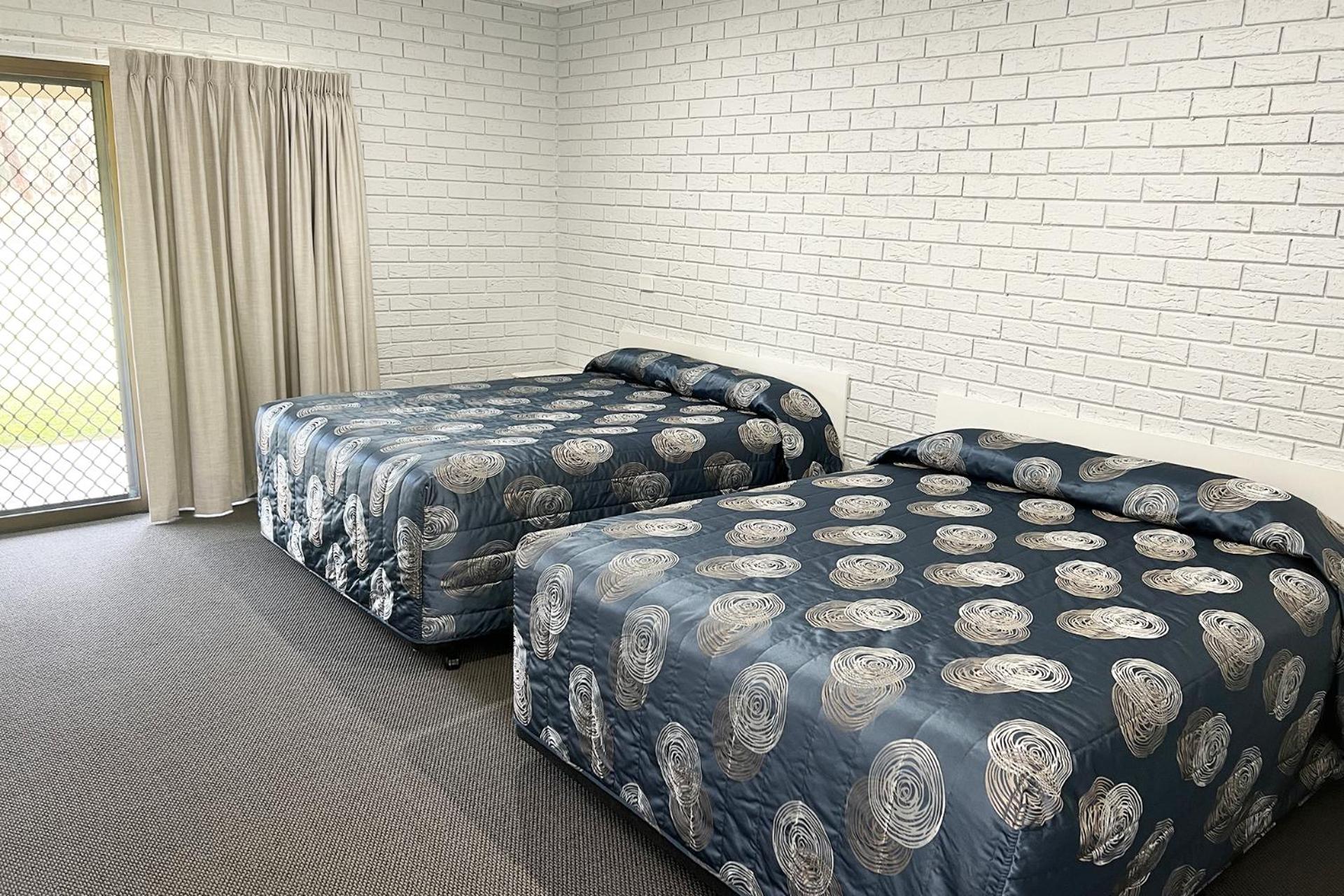 Queen Room with Two Queen Beds - Photo 1