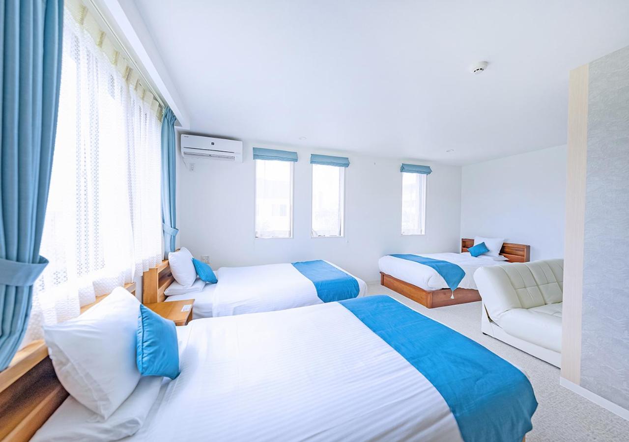 Deluxe Triple Room - Photo 9