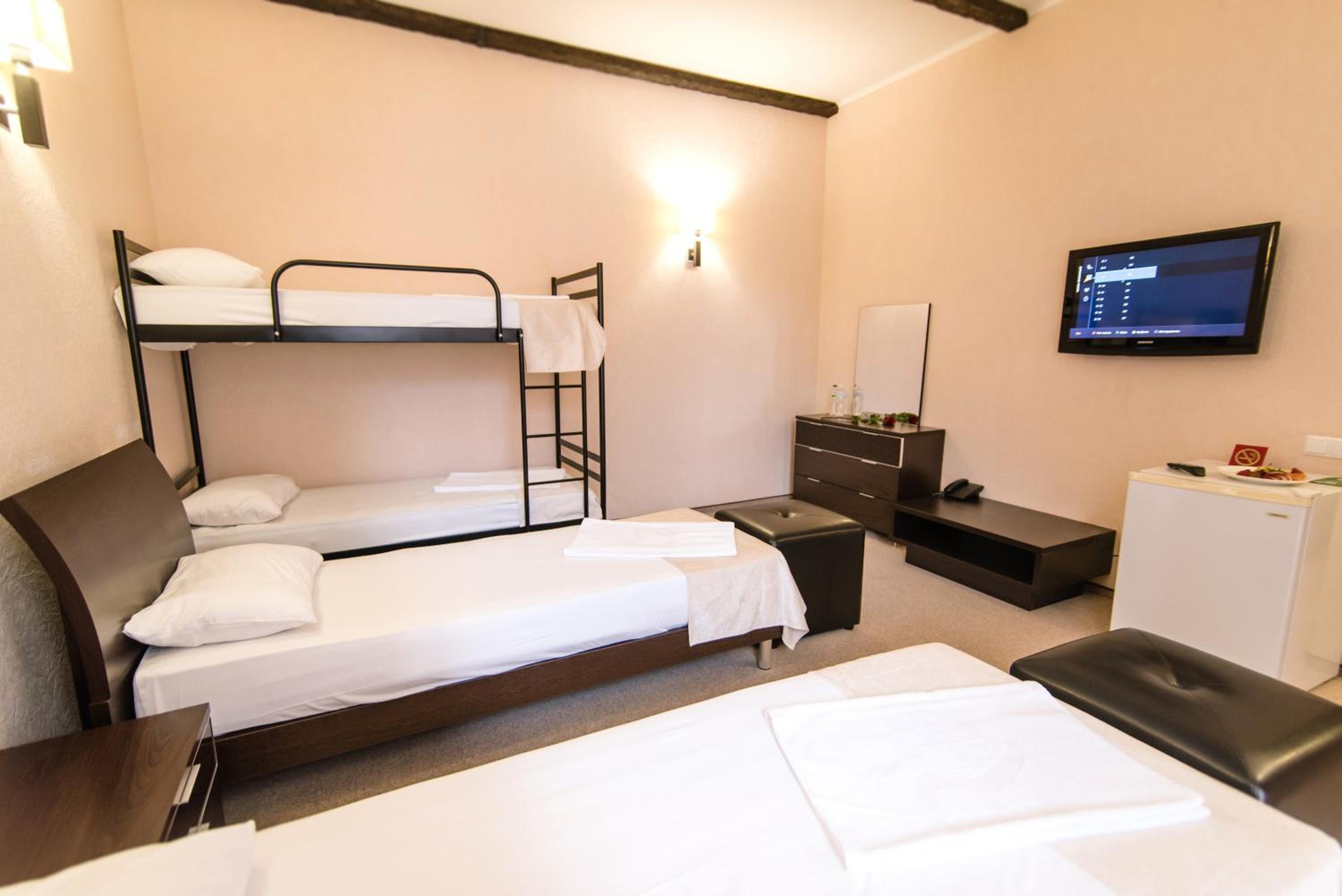 Quadruple Room with Balcony photo 2