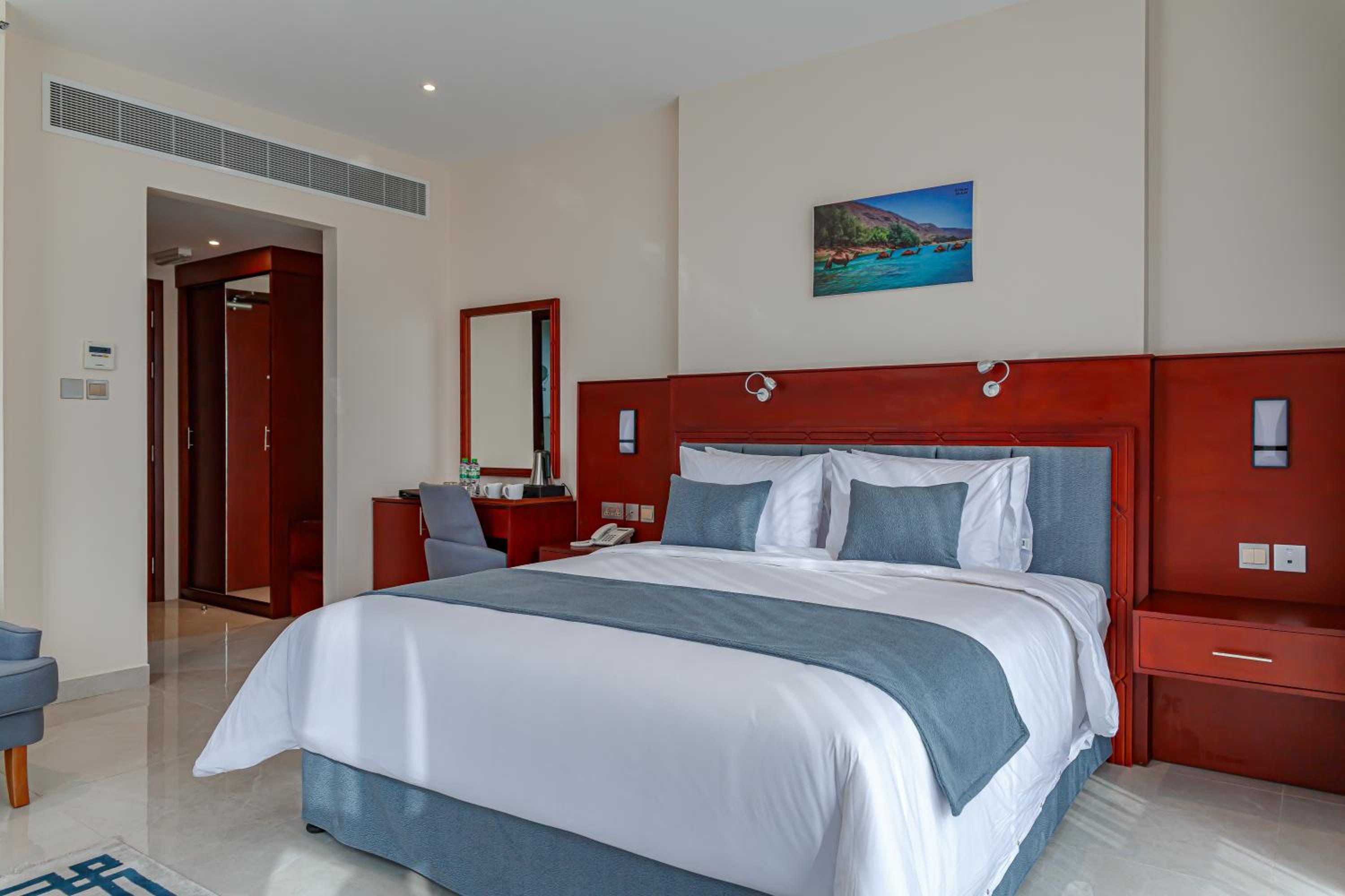 Deluxe Room - Photo 10