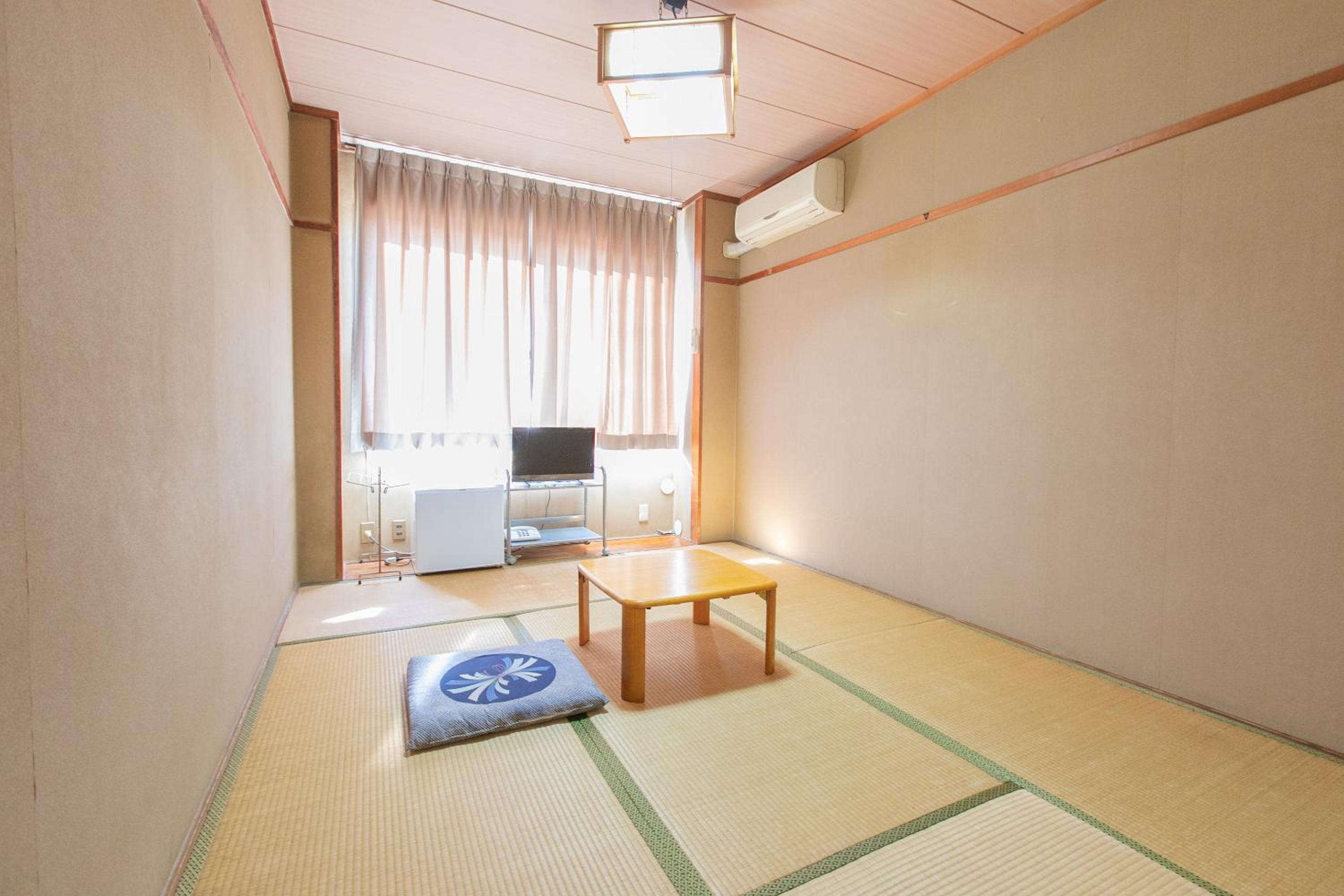 Standard Twin Room - Photo 7
