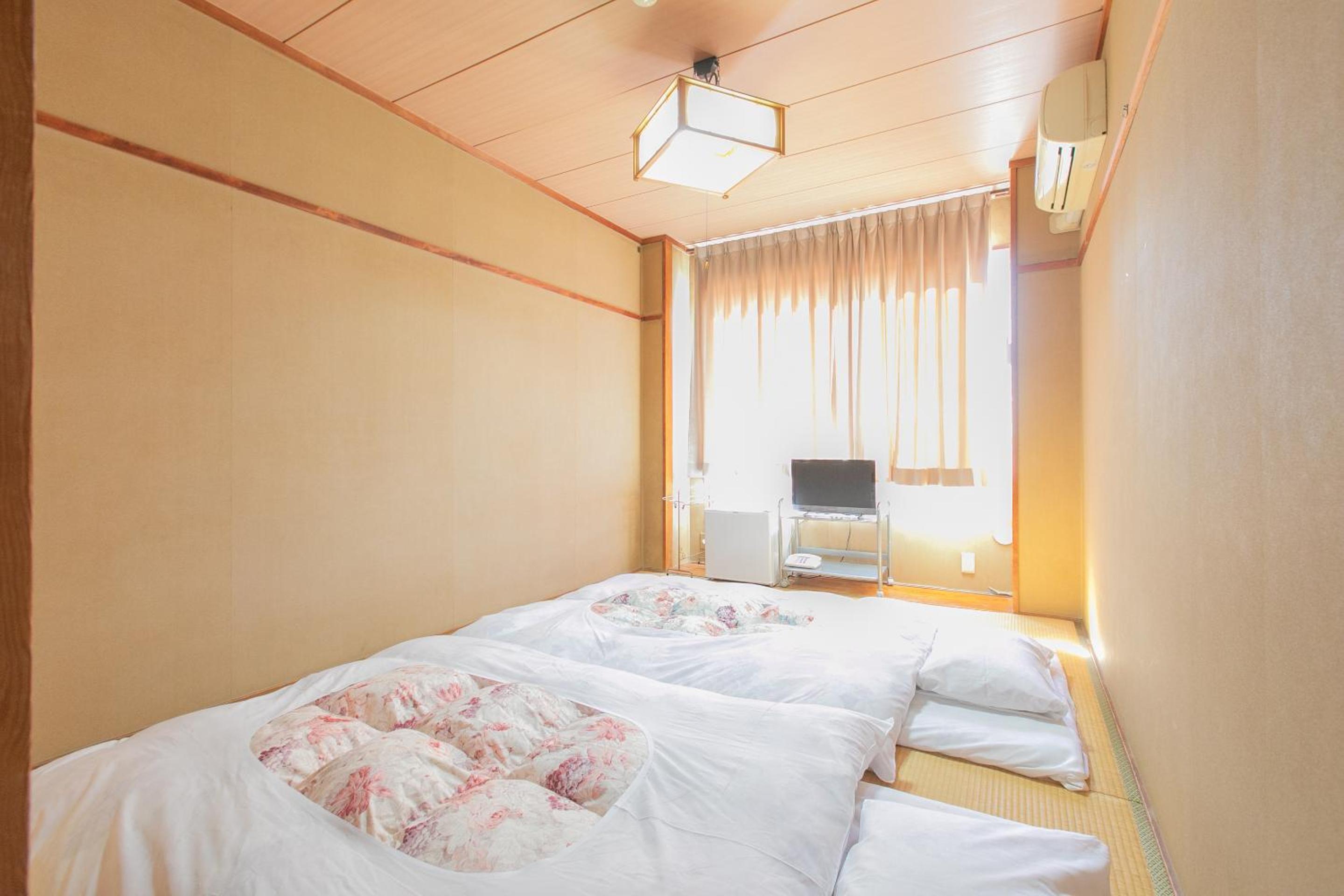 Standard Twin Room - Photo 14