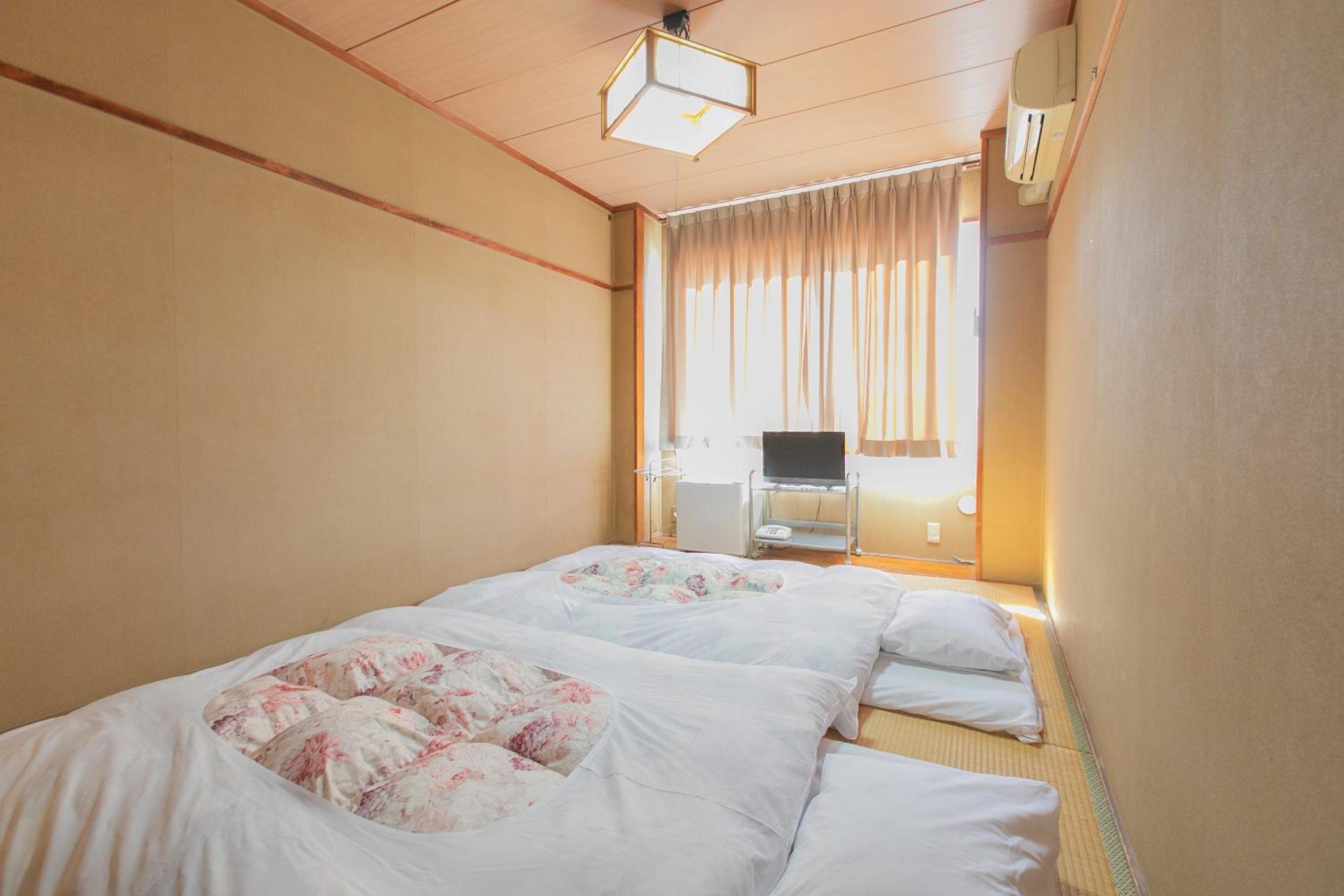 Standard Twin Room - Photo 17