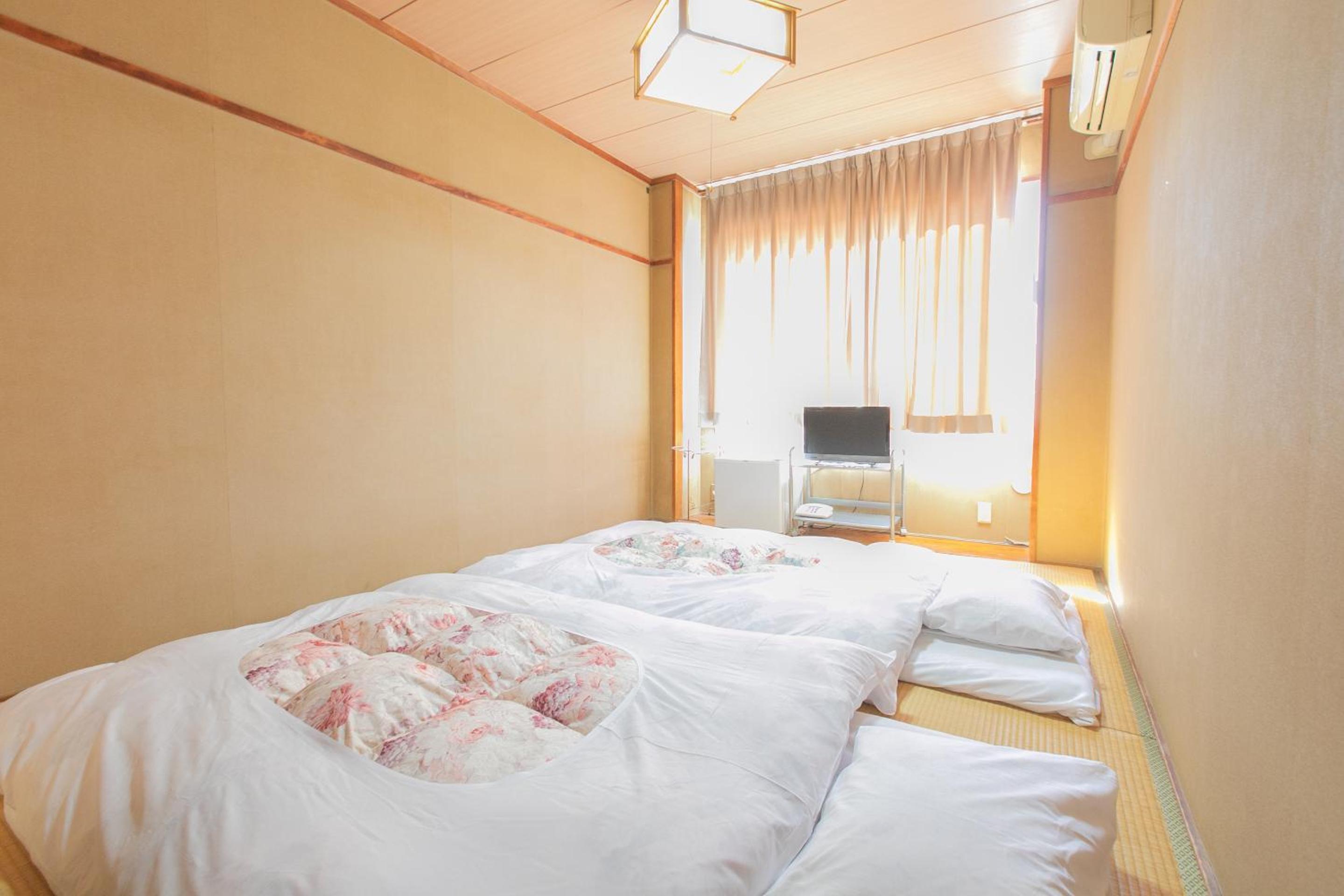 Standard Twin Room - Photo 16