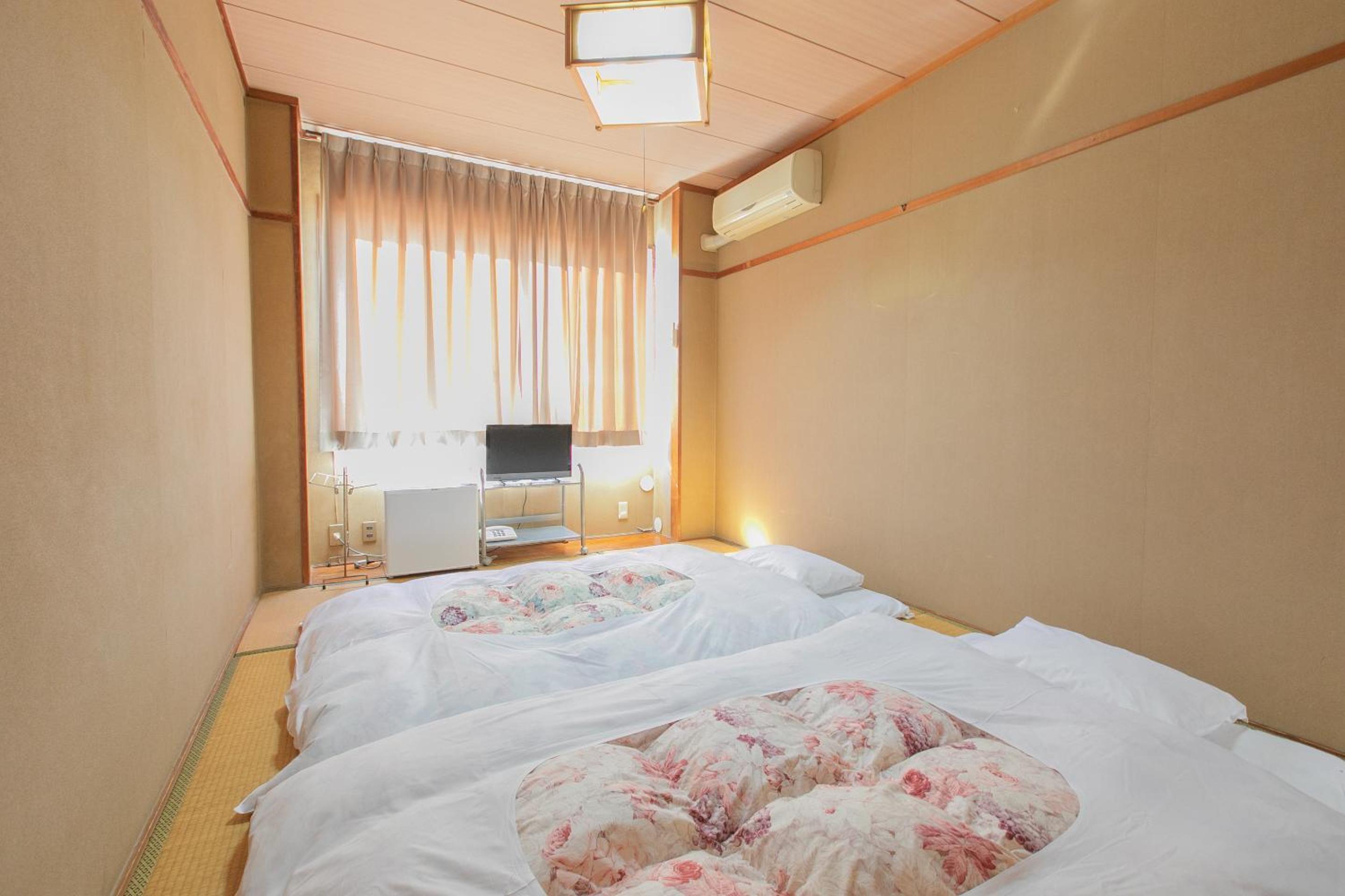 Standard Twin Room - Photo 15
