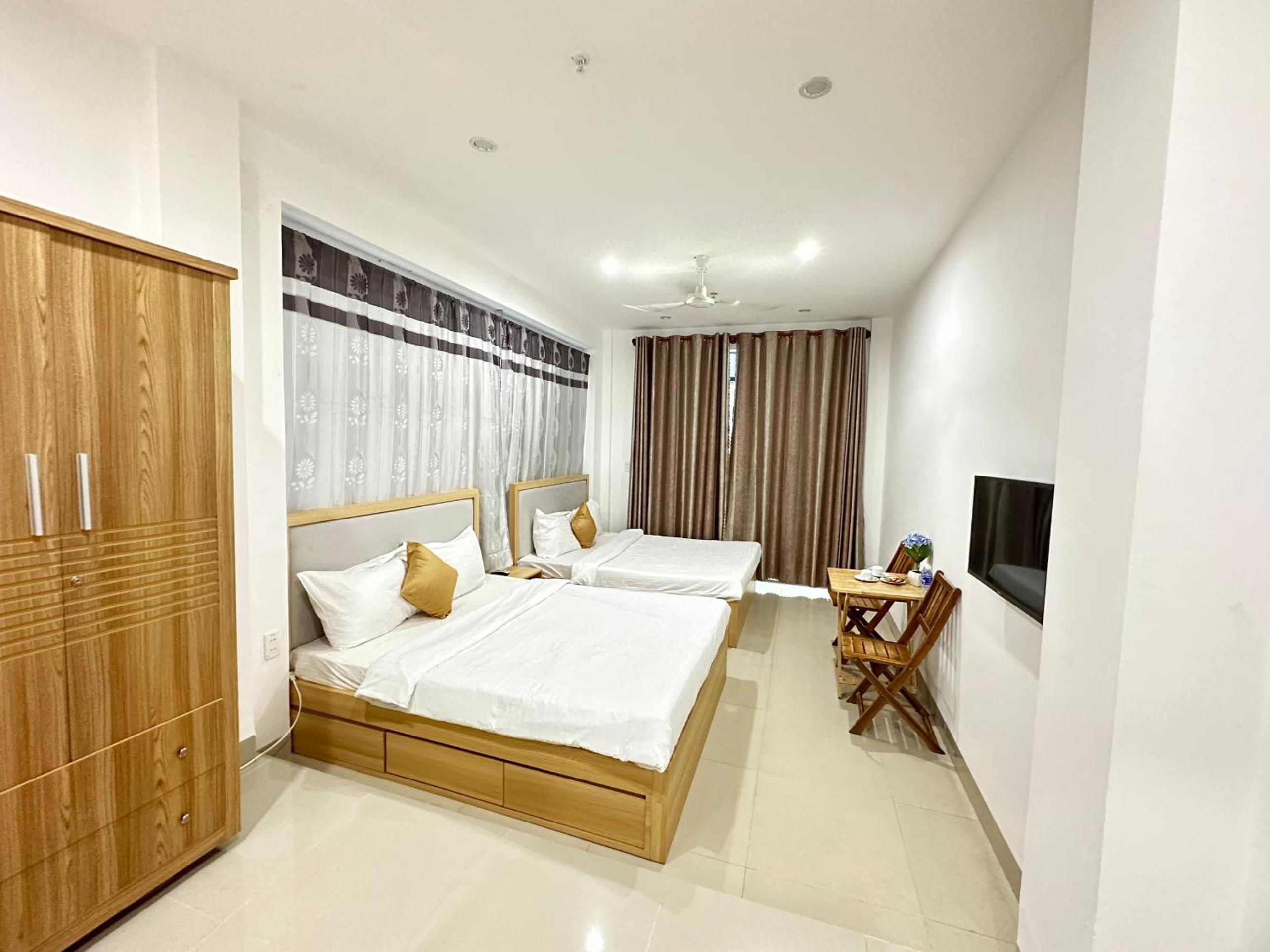 Deluxe Quadruple Room - Photo 14