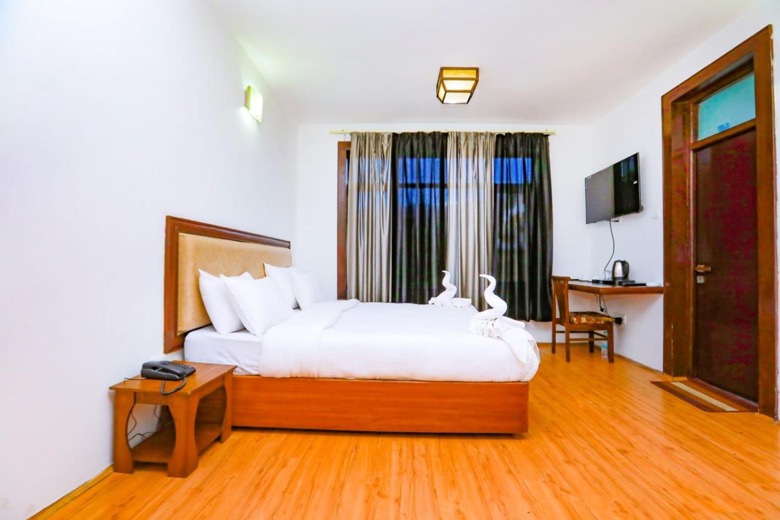 Deluxe Room - Photo 21