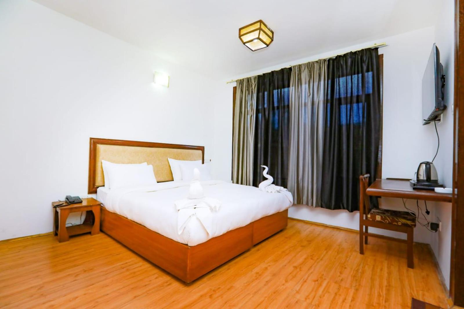 Deluxe Room - Photo 13
