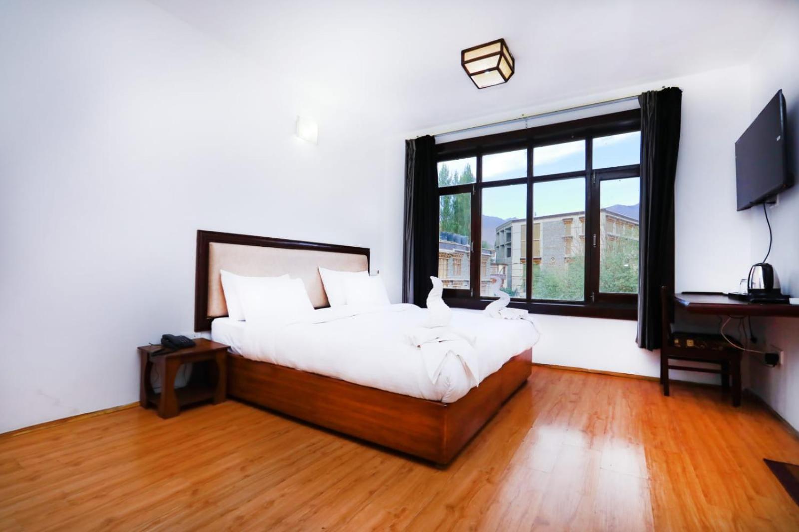 Deluxe Room - Photo 1