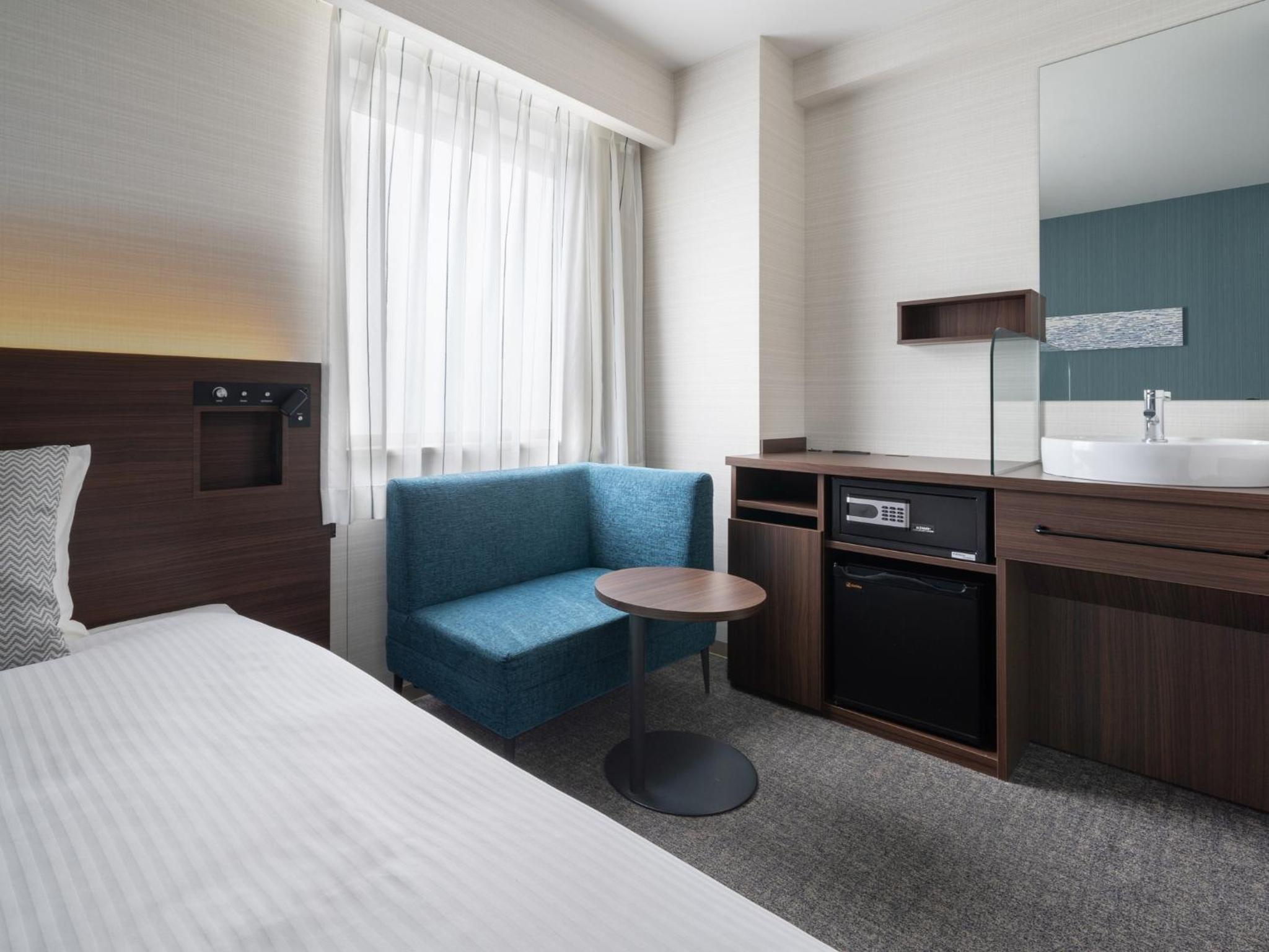 Twin Room - Photo 16