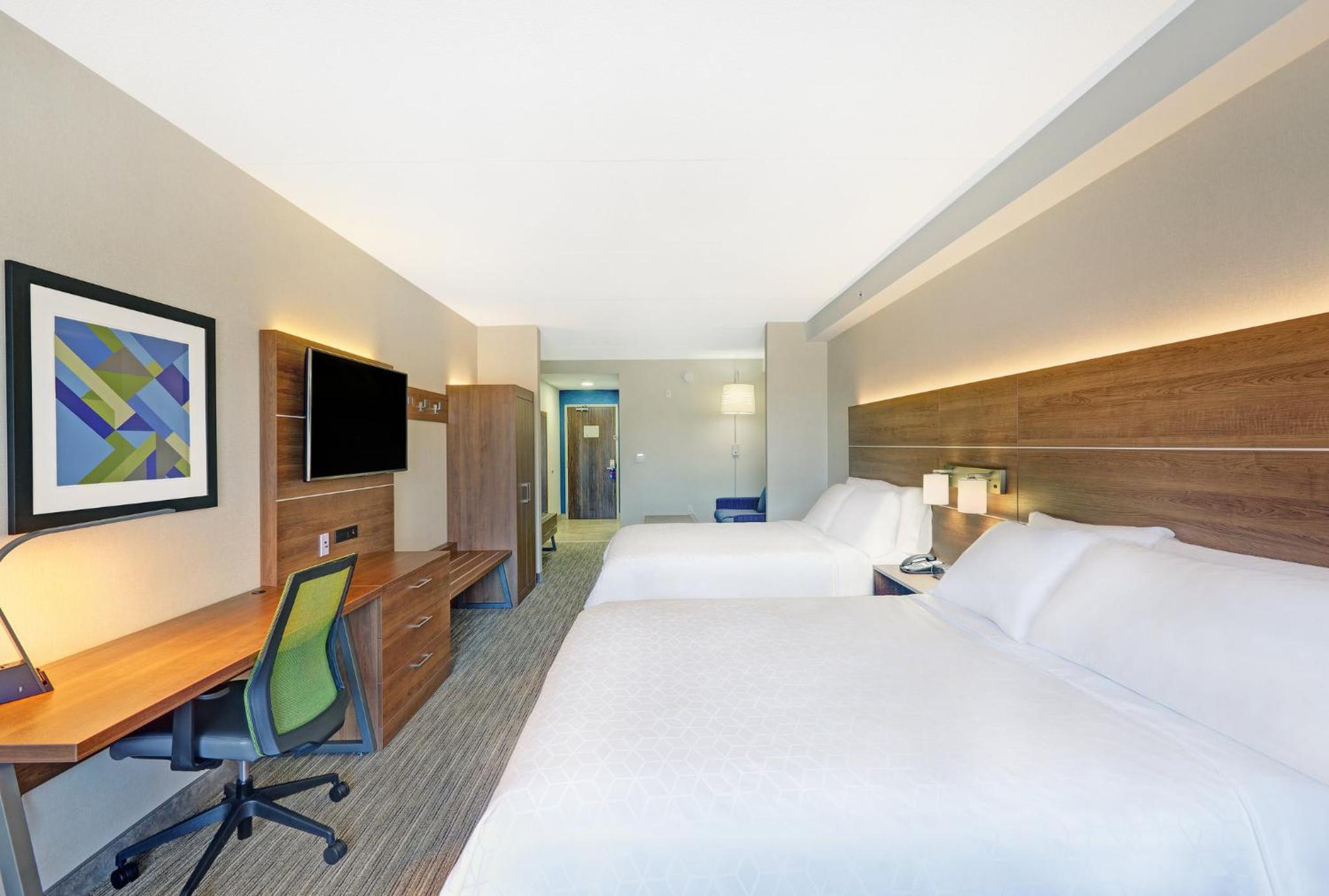 Queen Suite with Two Queen Beds and Sofa Bed - Photo 1