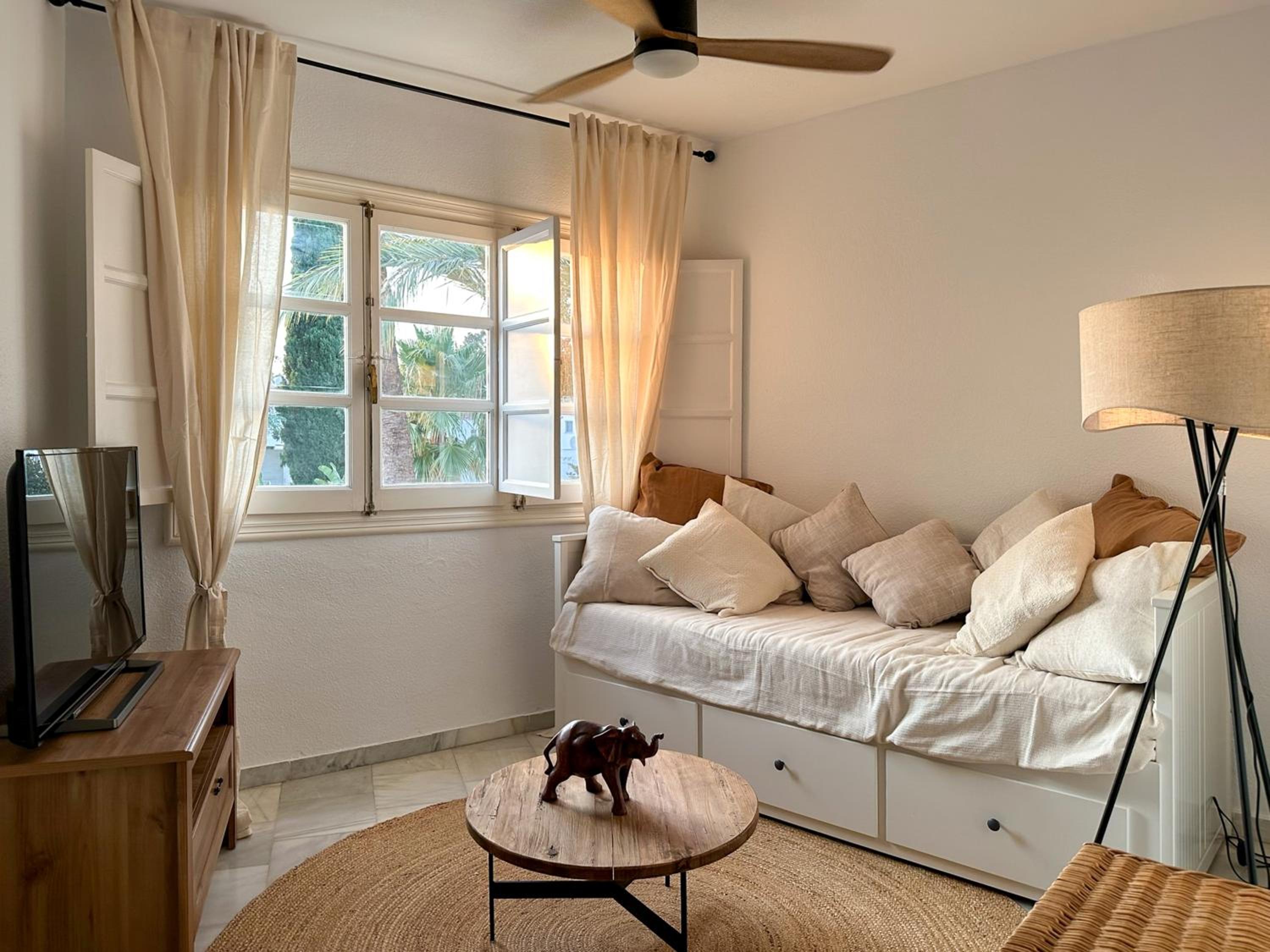 Apartamento con vista al jardín