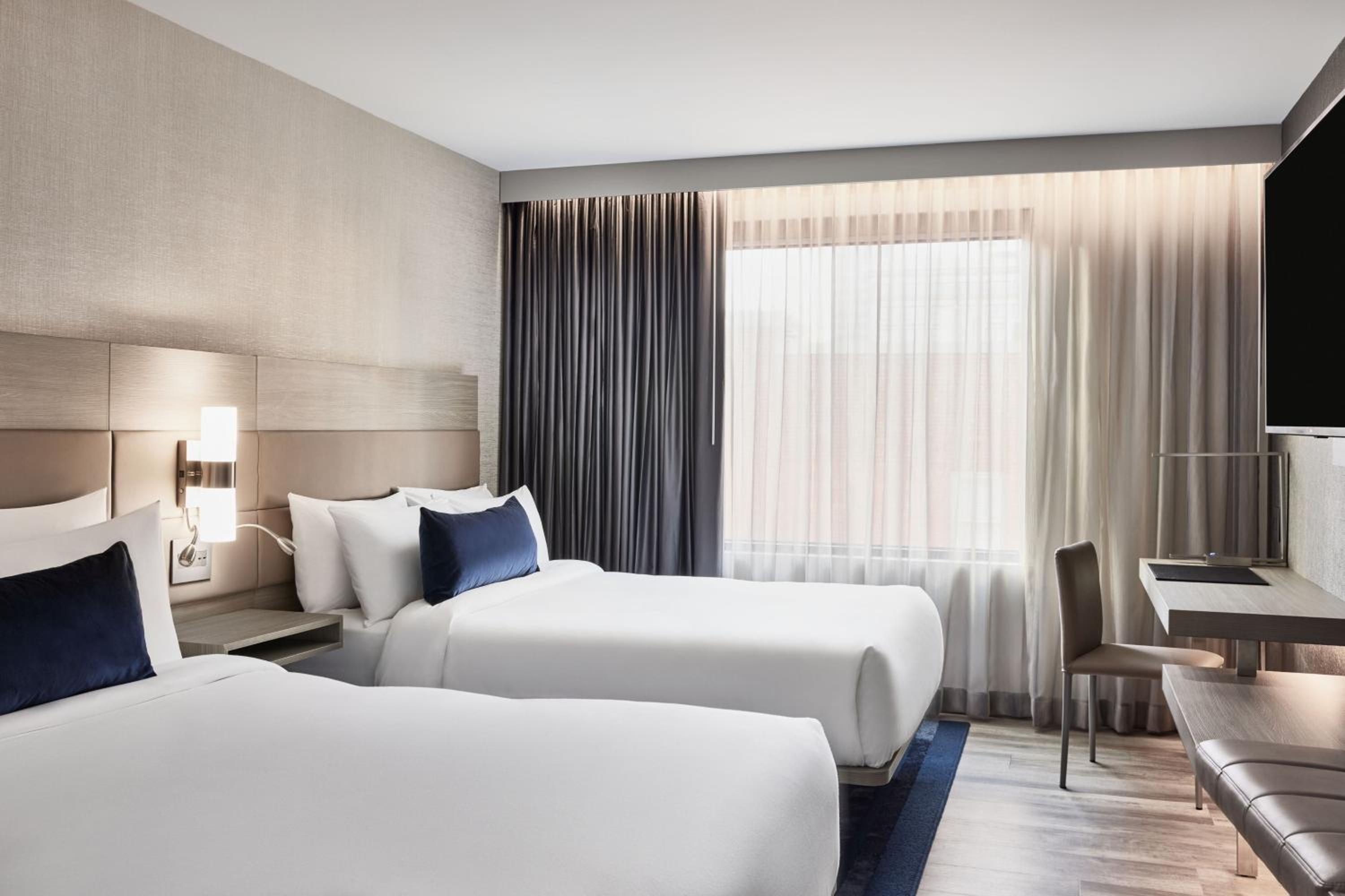 Standard Queen Room with Two Queen Beds - Photo 1