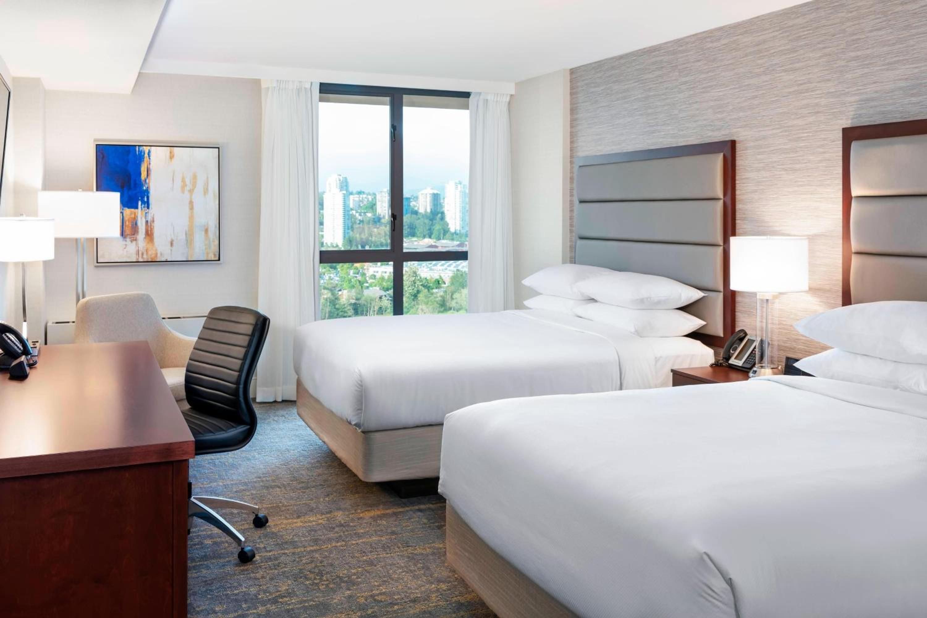 Deluxe Queen Room with 2 Queen Beds - Photo 1