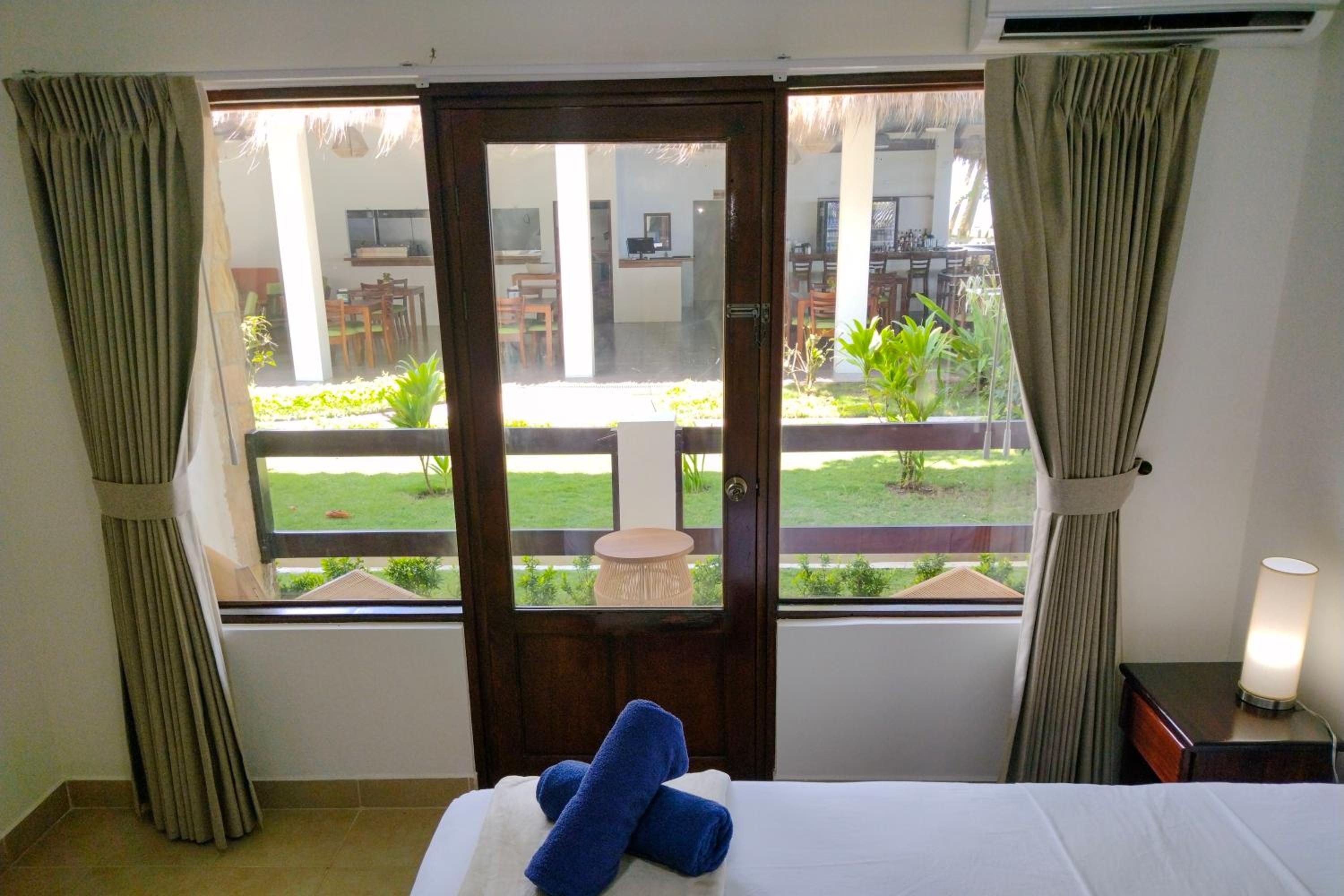 Standard Room  Plus 1 Queen Bed + 1 Twin Bed - Photo 2