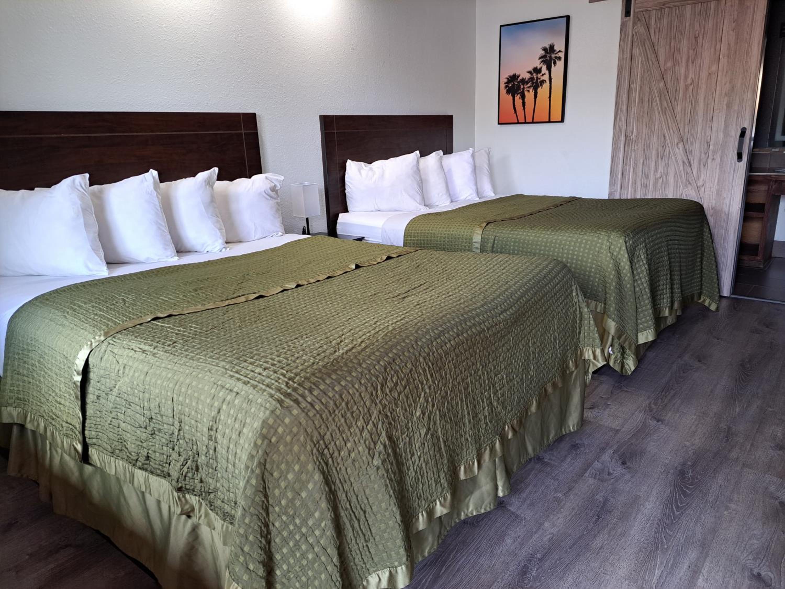 Queen Room with Two Queen Beds - Photo 1