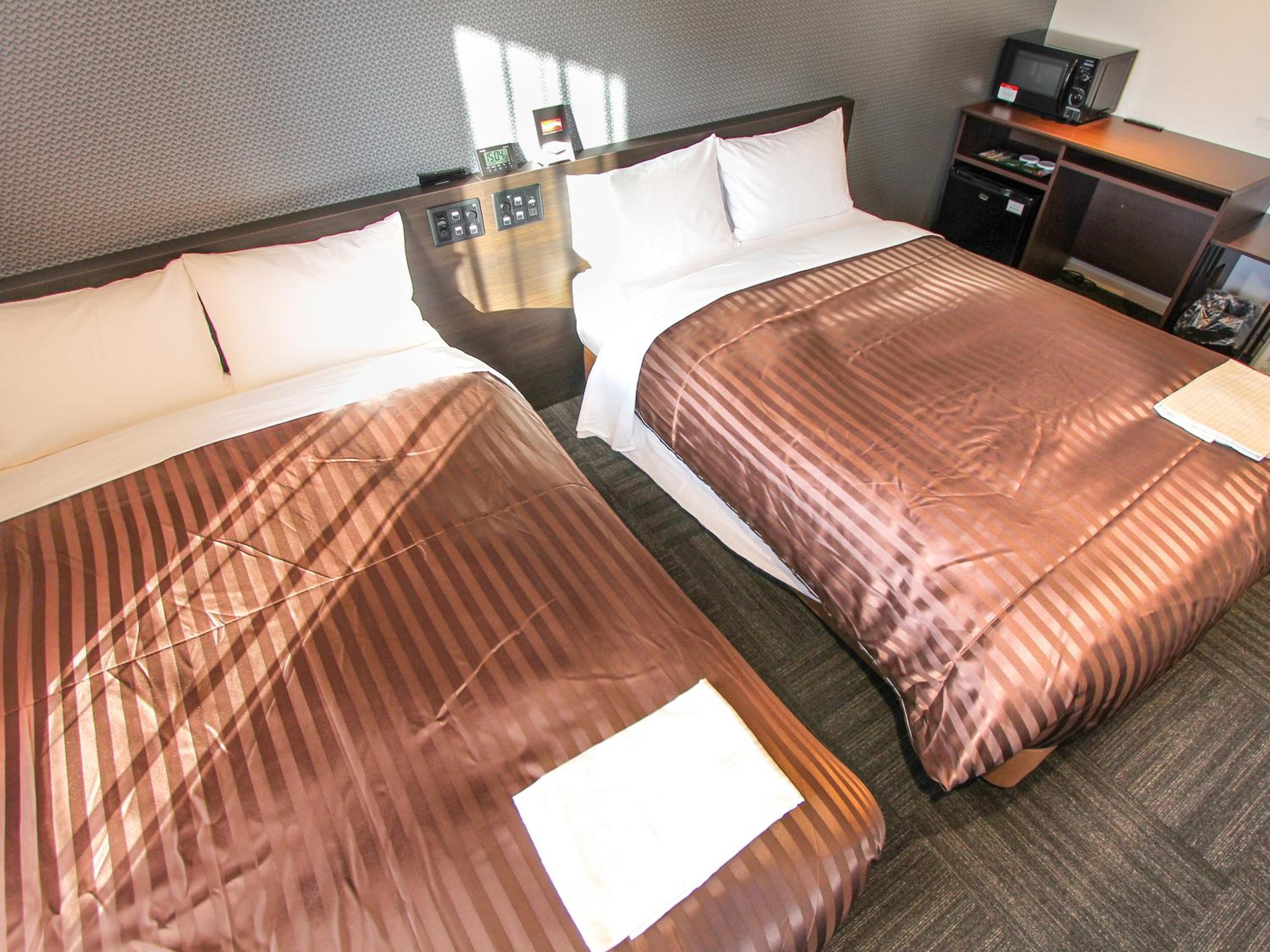 Twin Room - Non-Smoking - Photo 1