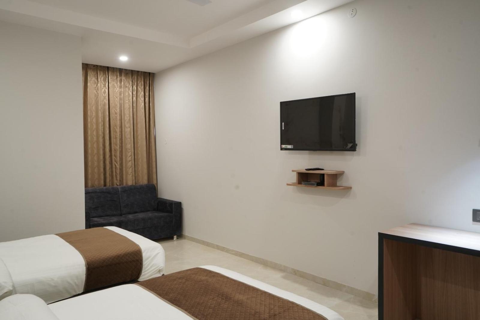 Deluxe Twin Room - Photo 11