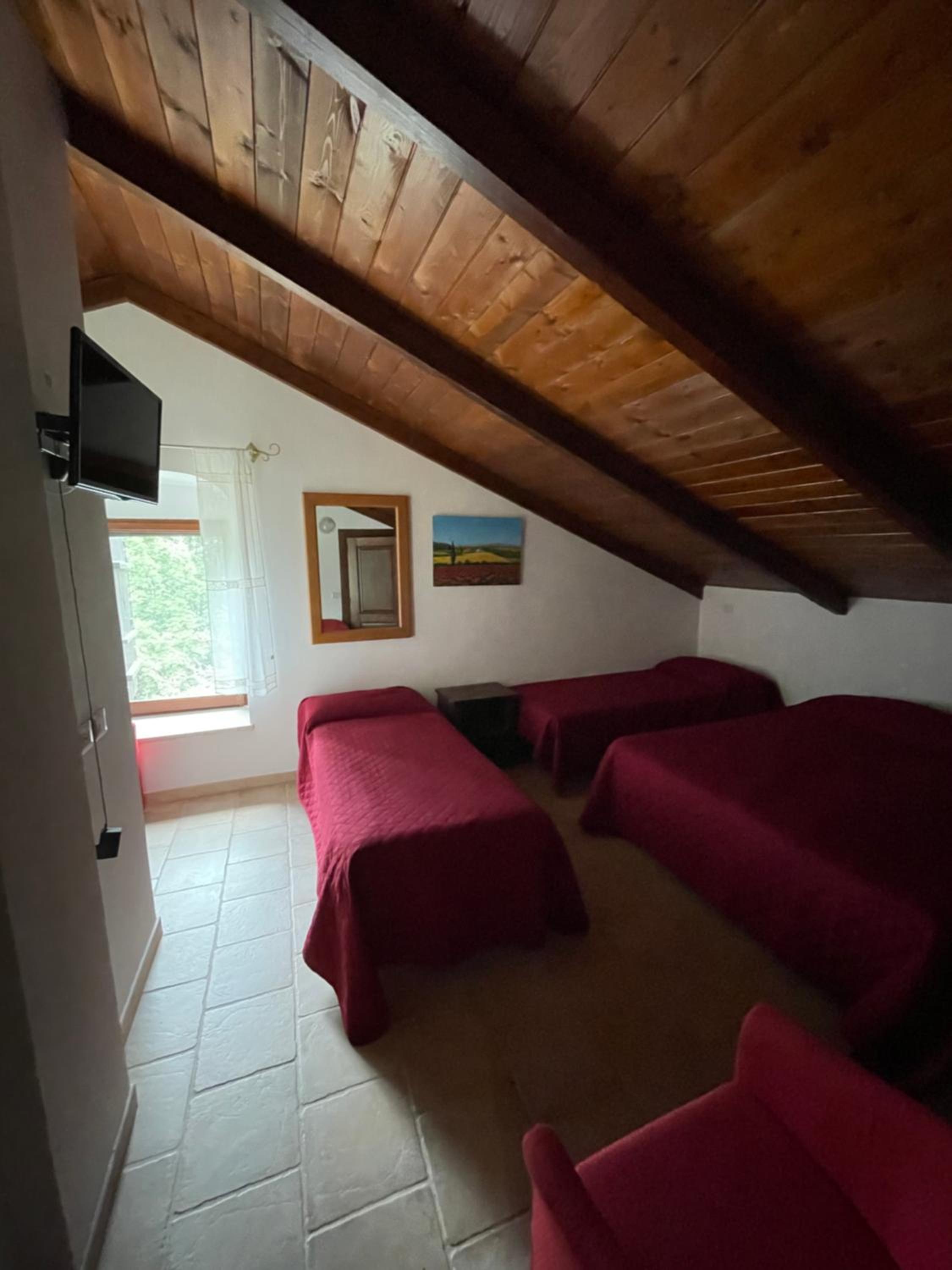 Quadruple Room with Private Bathroom