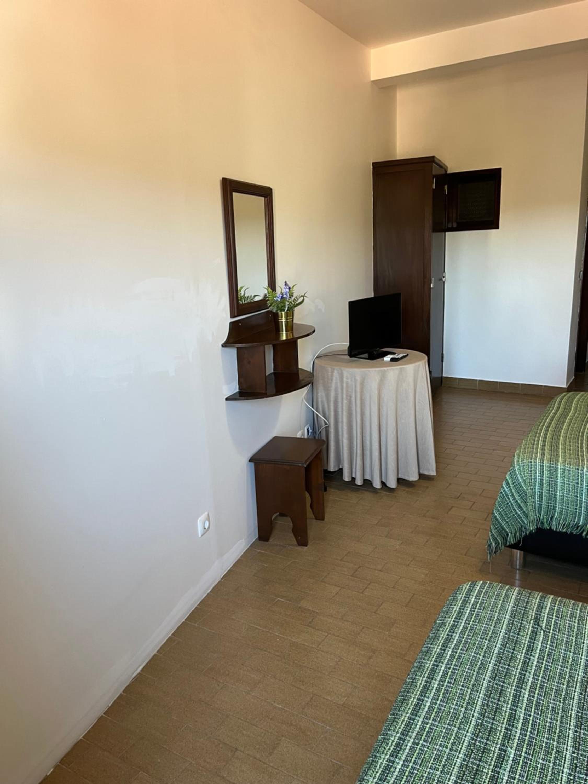 Economy Triple Room photo 1