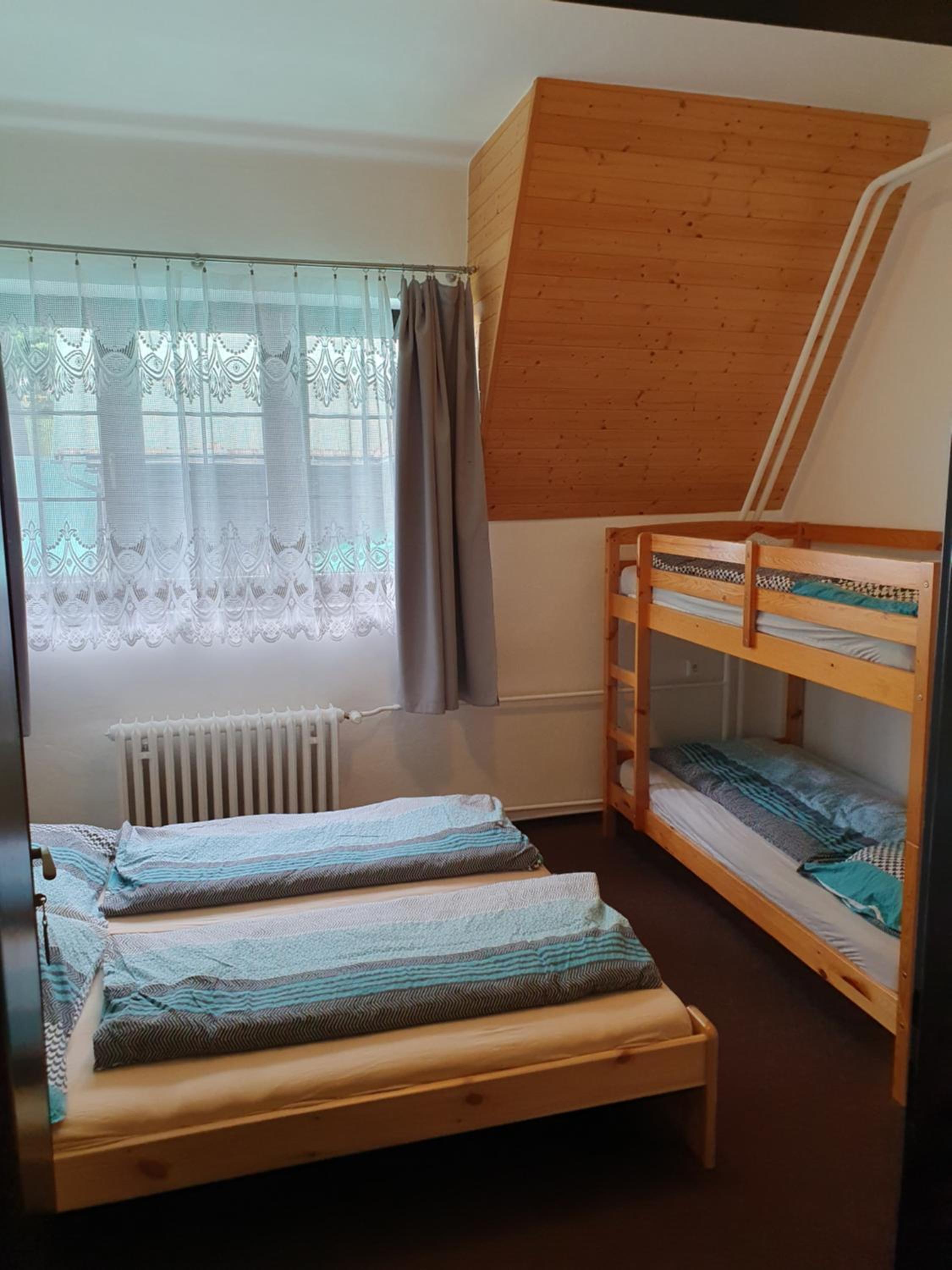 Economy Quadruple Room with Shared Bathroom