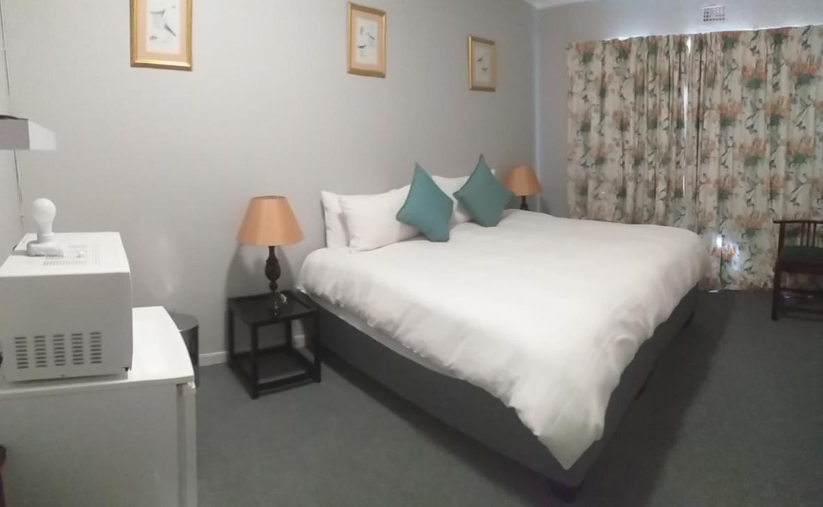 Deluxe Queen Room - Photo 7