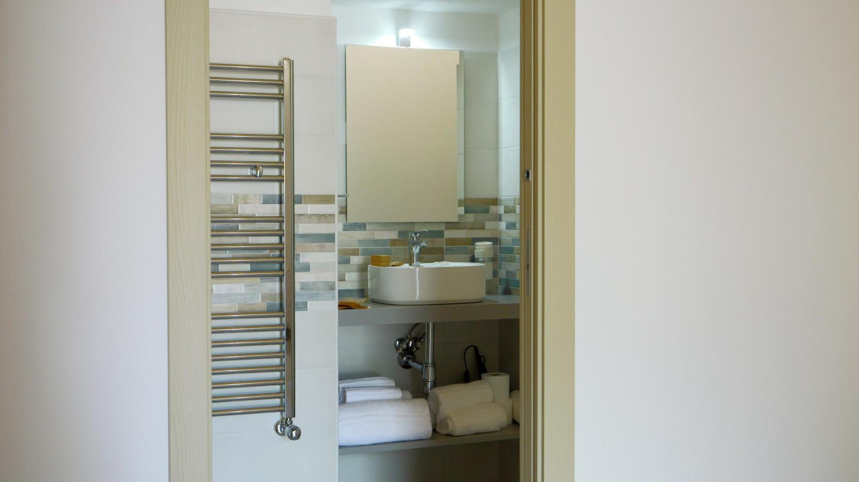 Deluxe Triple Room - Photo 20