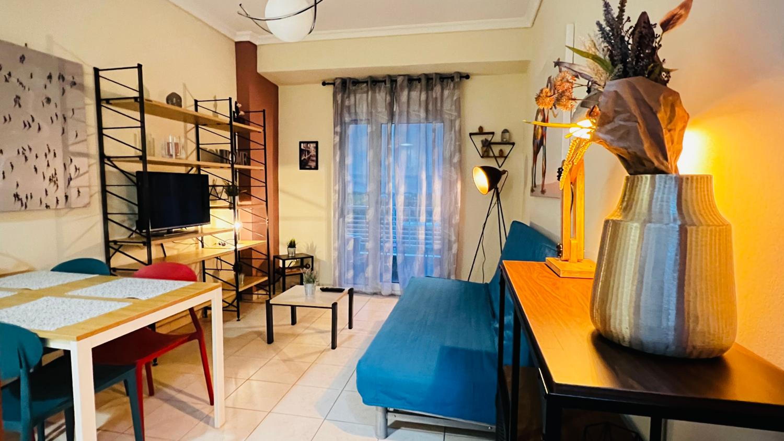 One-Bedroom Apartment with Balcony and City View