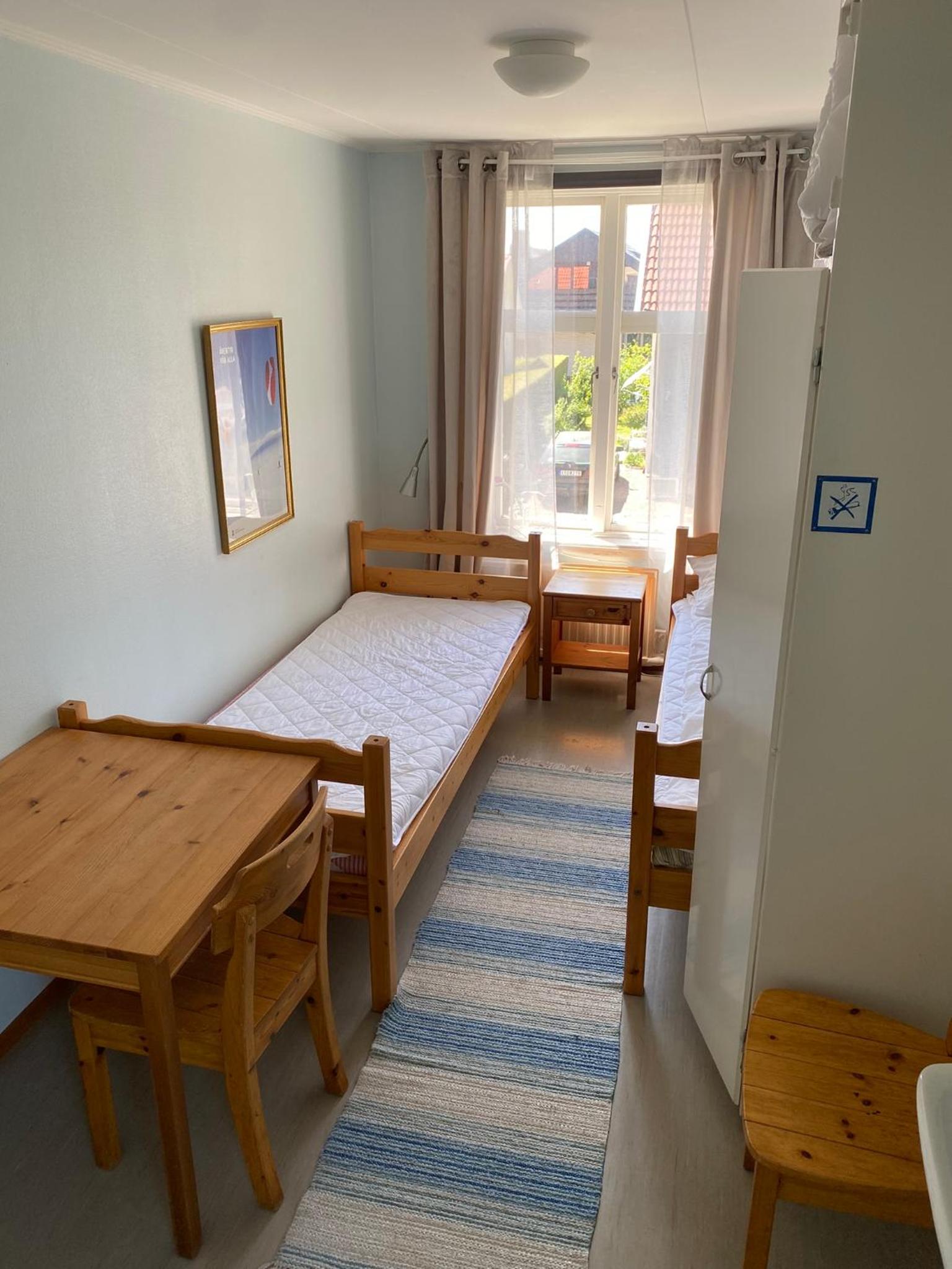 Queen Room with Shared Bathroom