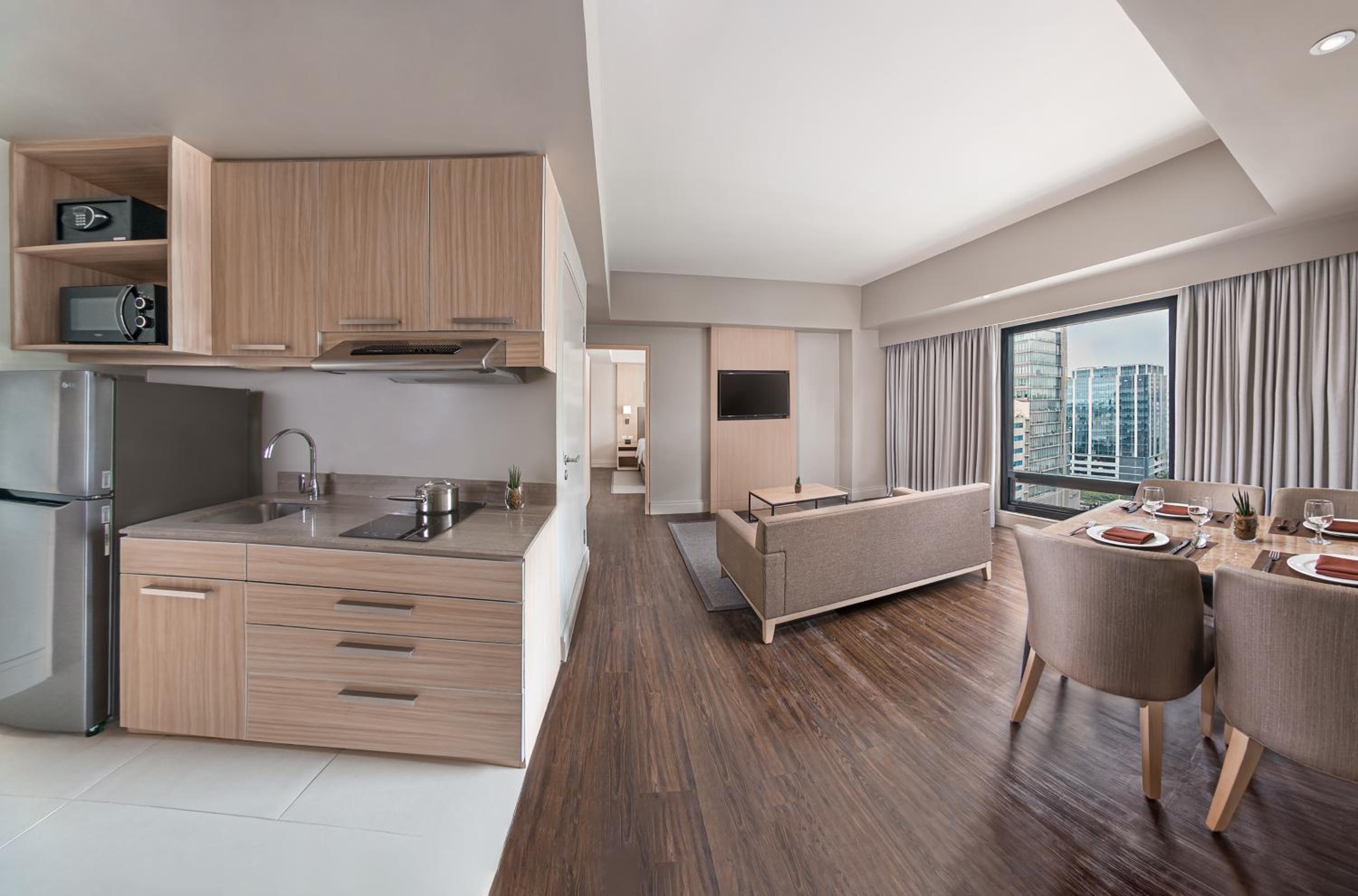 1 King Bed, One-Bedroom with Kitchenette and Living Area - Photo 1