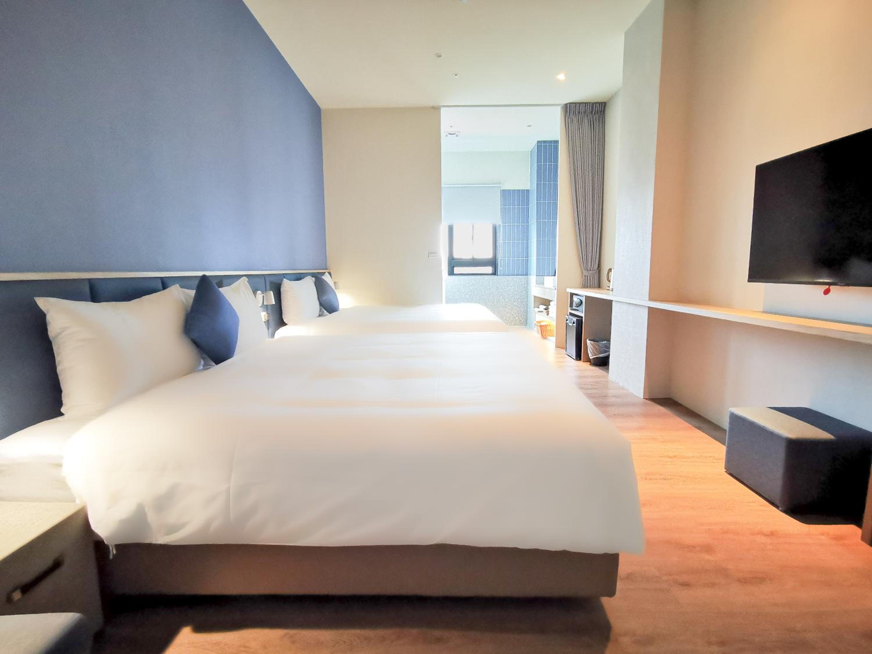 Deluxe Quadruple Room - Photo 7