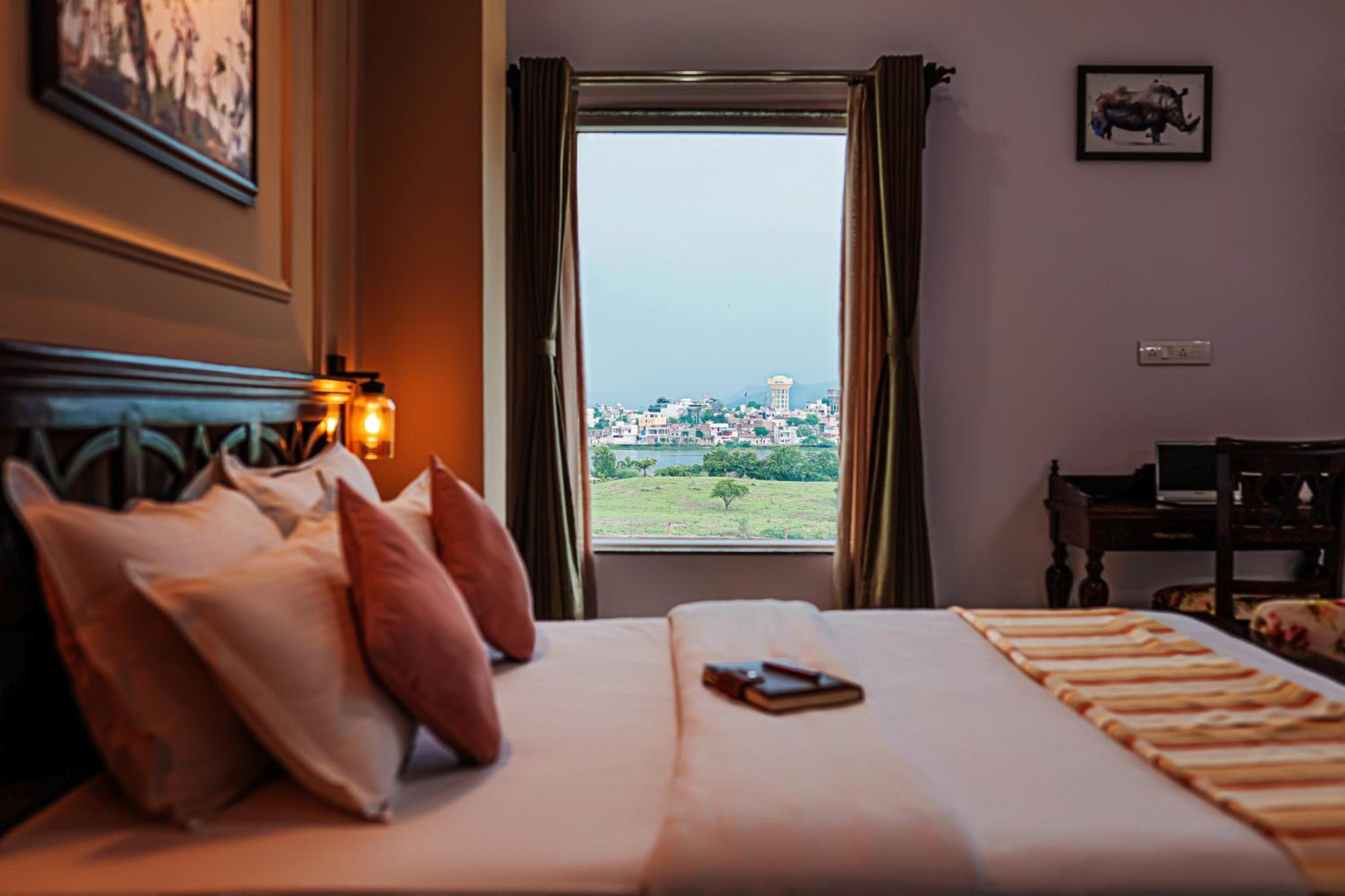 Lake View Room: Complimentary Pick up from Railway Station, Welcome Drink, F&B Discount 10%