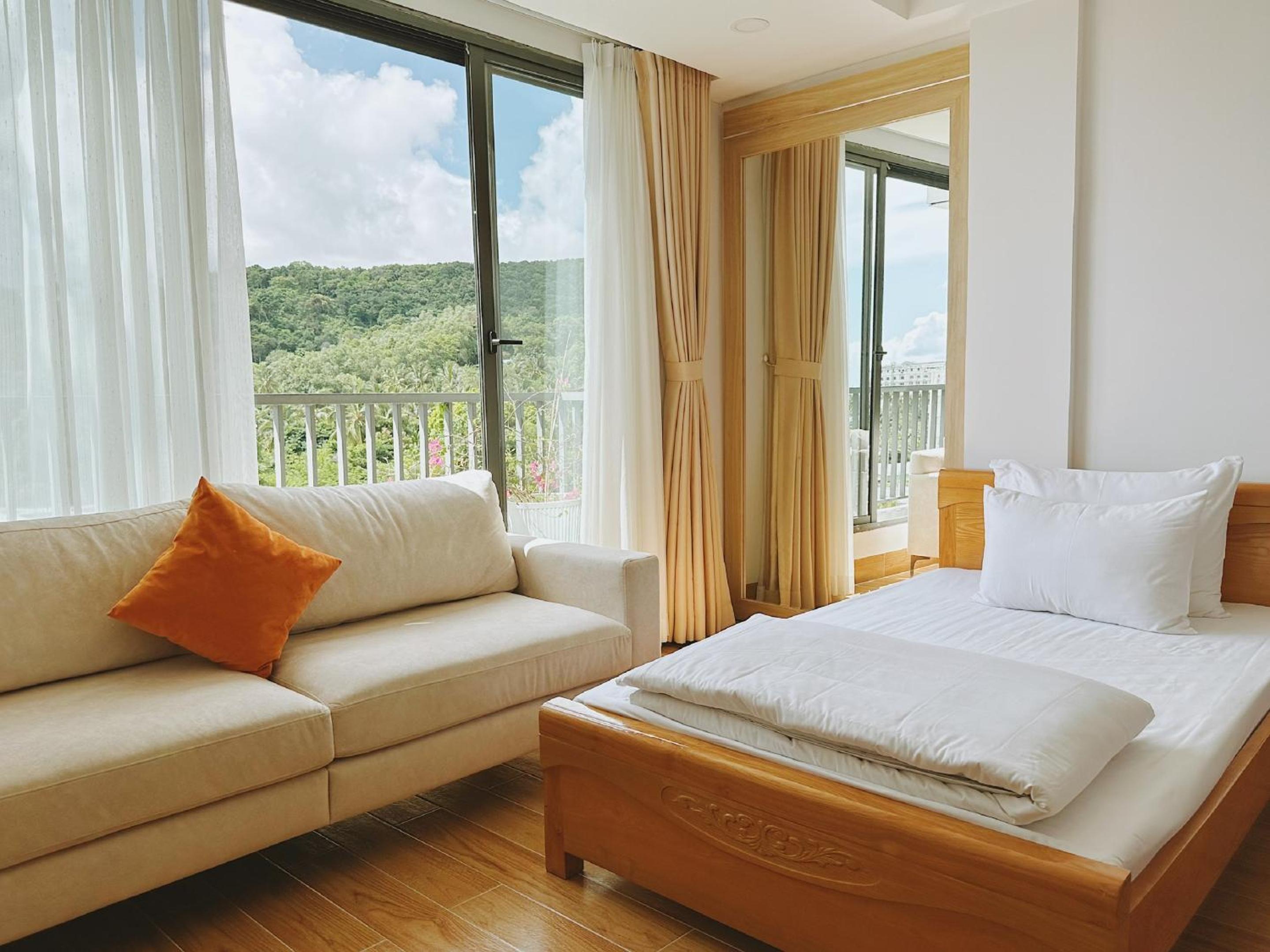 Family Room with Balcony - Photo 10