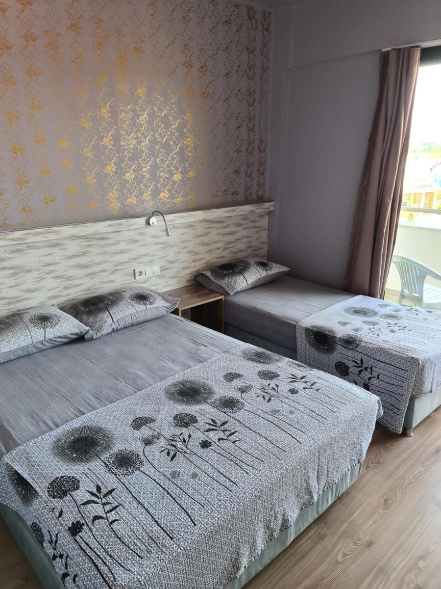 Family Room (3 Adults) with Balcony photo 1