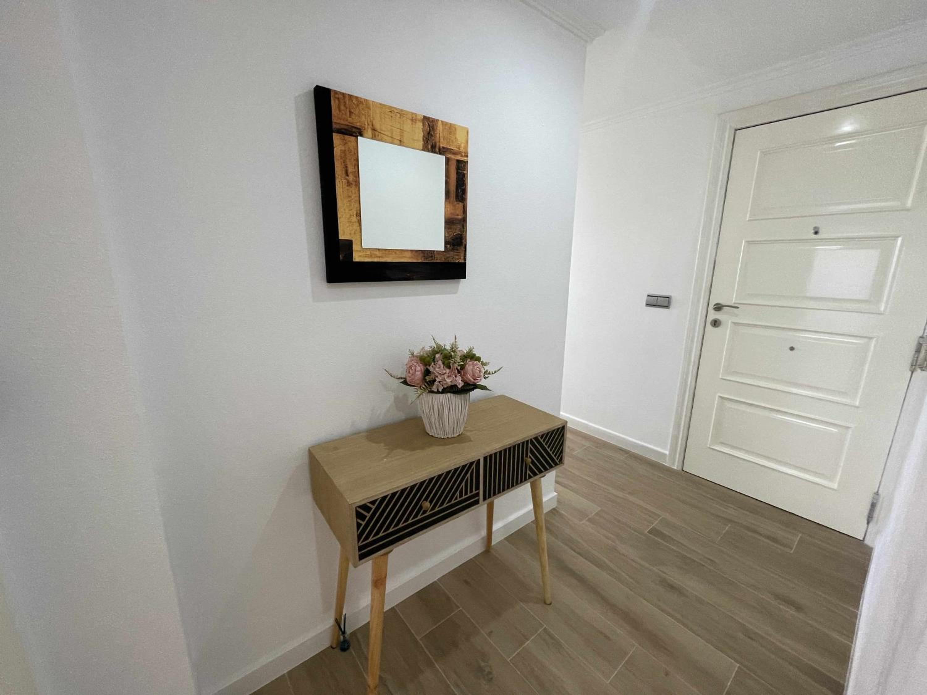 Three-Bedroom Apartment photo 2