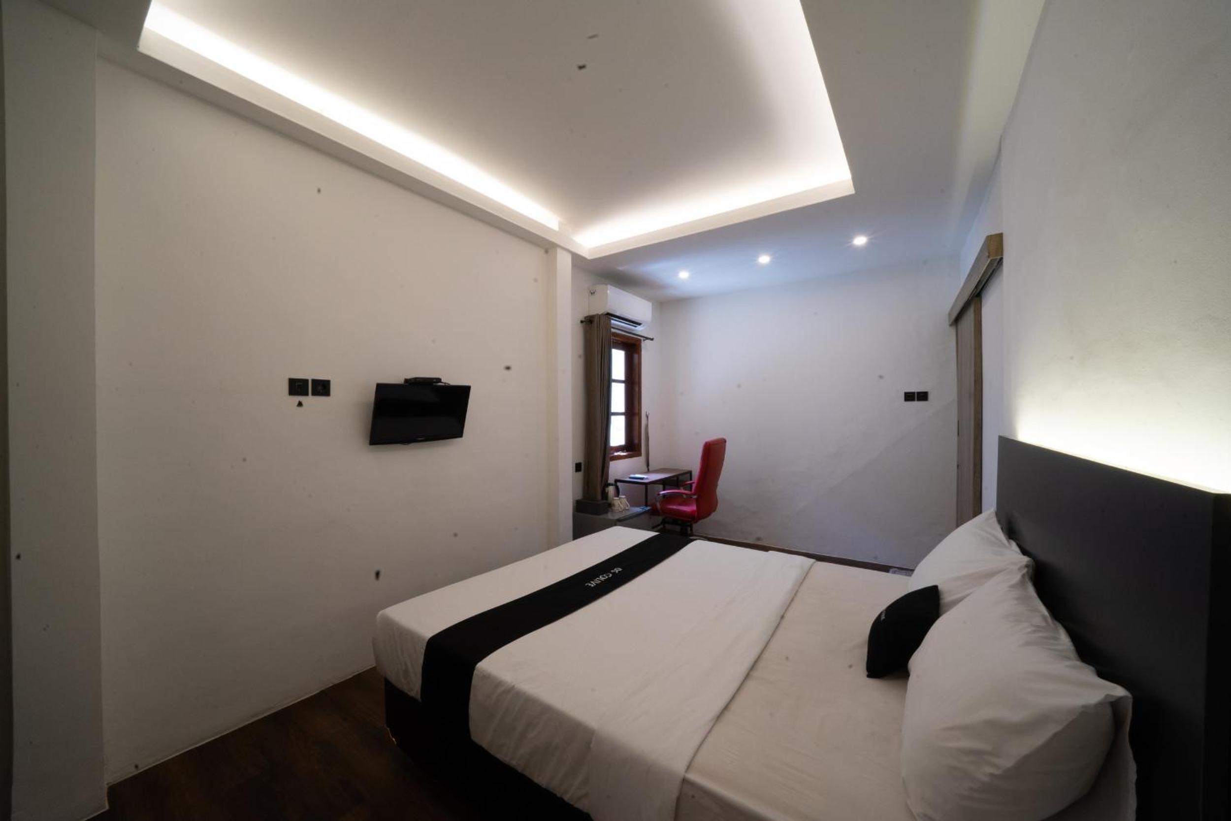 Deluxe Room - Photo 6